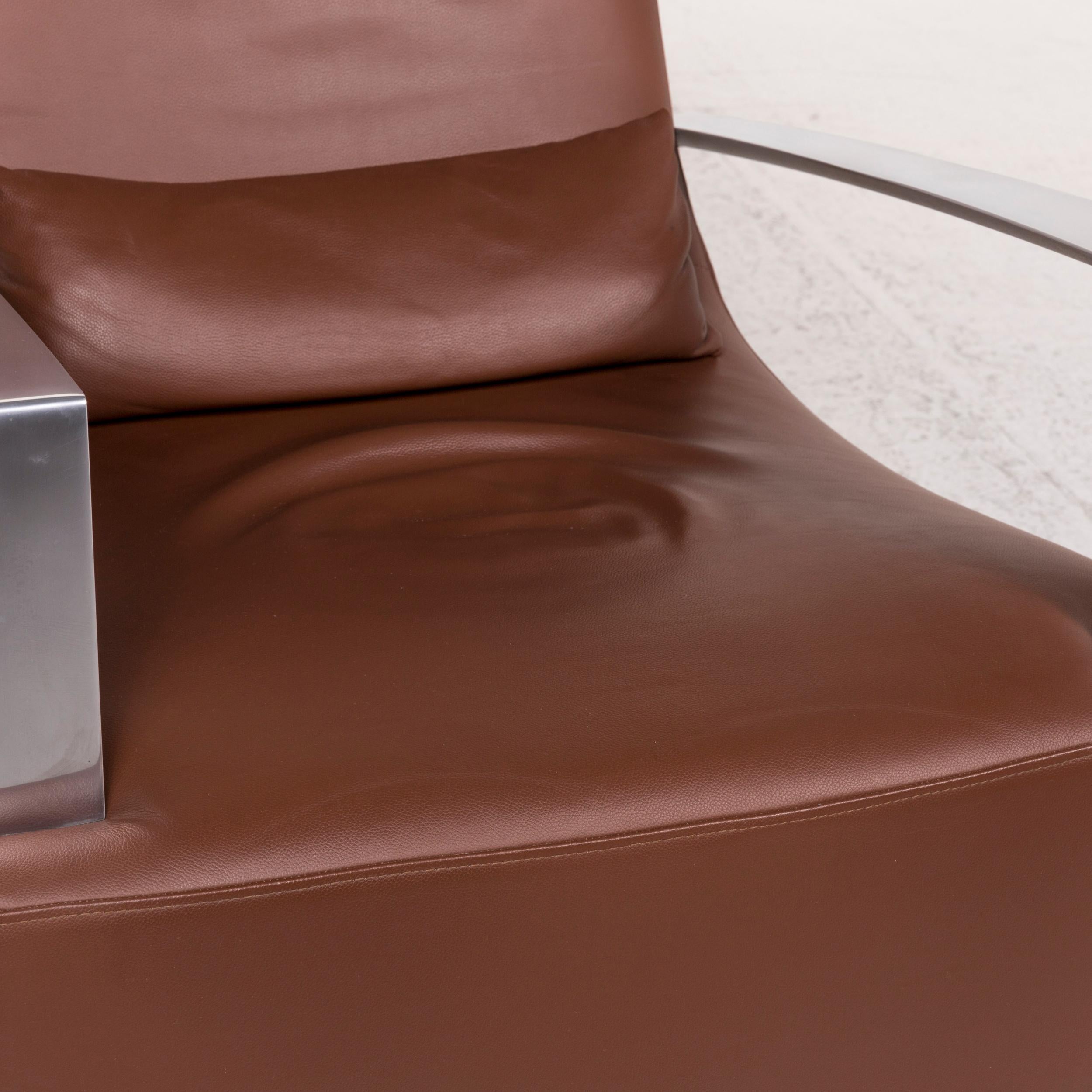 We bring to you a Ligne Roset leather armchair incl. stool brown rocking function.


 Product measurements in centimeters:
 

Depth 85
Width 72
Height 84
Seat-height 40
Rest-height 58
Seat-depth 50
Seat-width 53
Back-height 47.
 