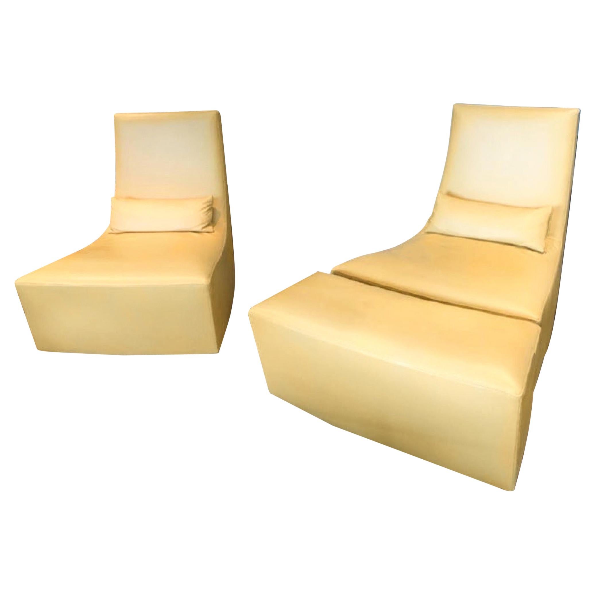 Ligne Roset slice leather rocker lounge chair set of two with ottoman, buttercup cream. Gorgeous modern fireside lounge chairs in Irish al leather with lumbar cushion and single ottoman. Sold as set. No longer in production. Made in France. Labeled.
