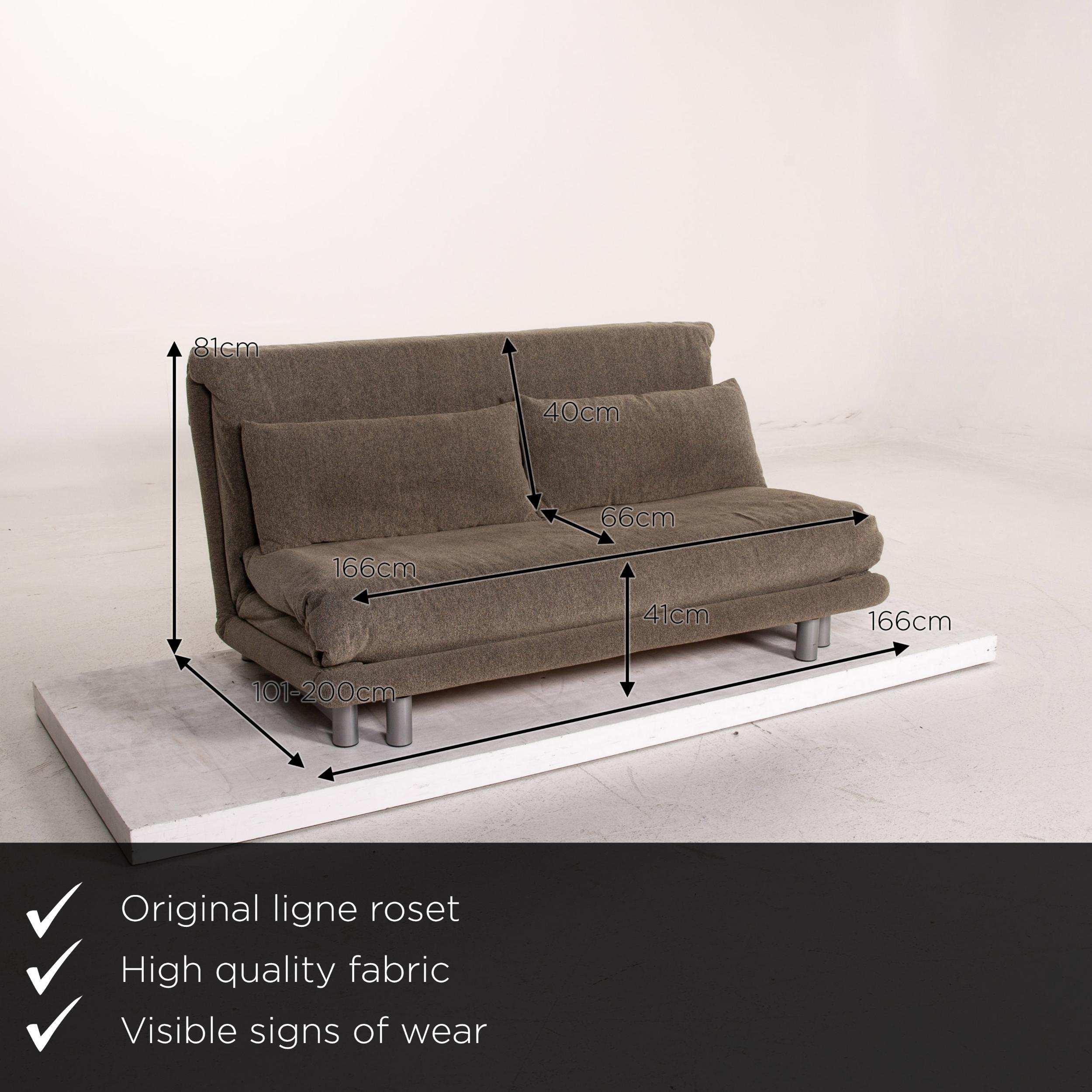 We present to you a ligne roset Multy fabric sofa bed gray gray green three-seat sofa function.
 

 Product measurements in centimeters:
 

Depth 101
Width 166
Height 81
Seat height 41
Seat depth 66
Seat width 166
Back height 40.


 