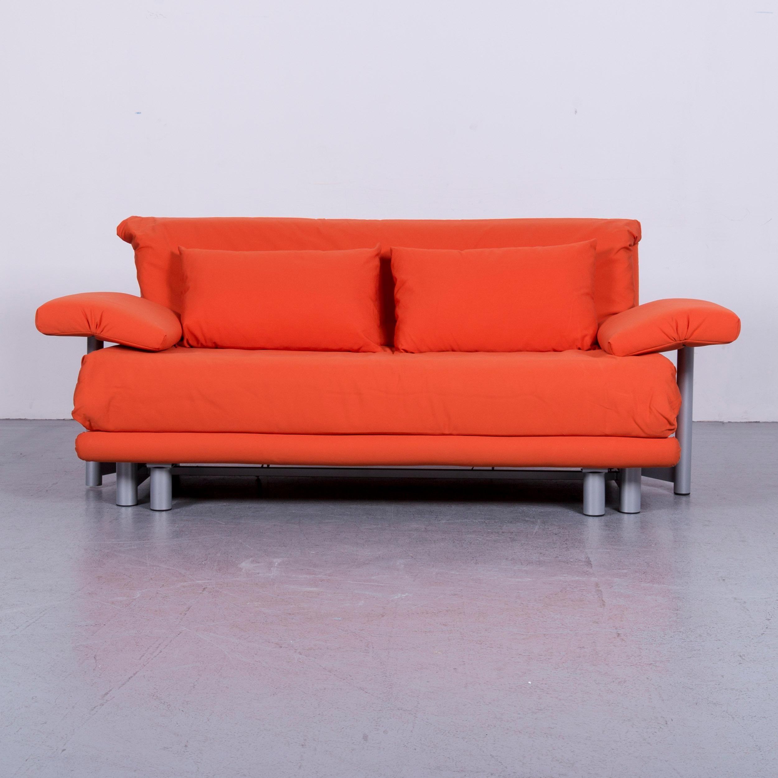 We bring to you an Ligne Roset Multy fabric sofa-bed orange two-seat couch sleep function.





























 