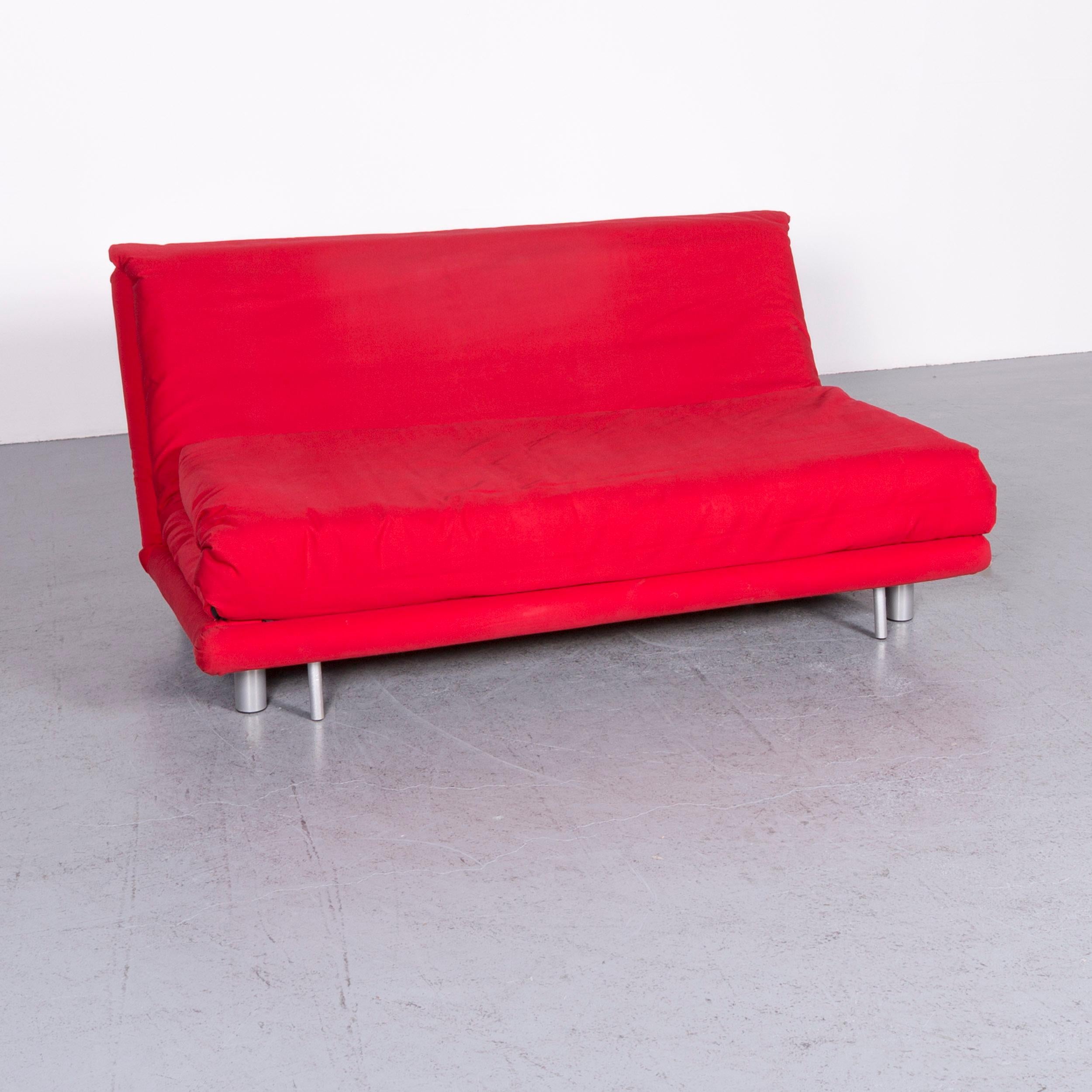 We bring to you an Ligne Roset Multy fabric sofa-bed red two-seat couch sleep function.




























