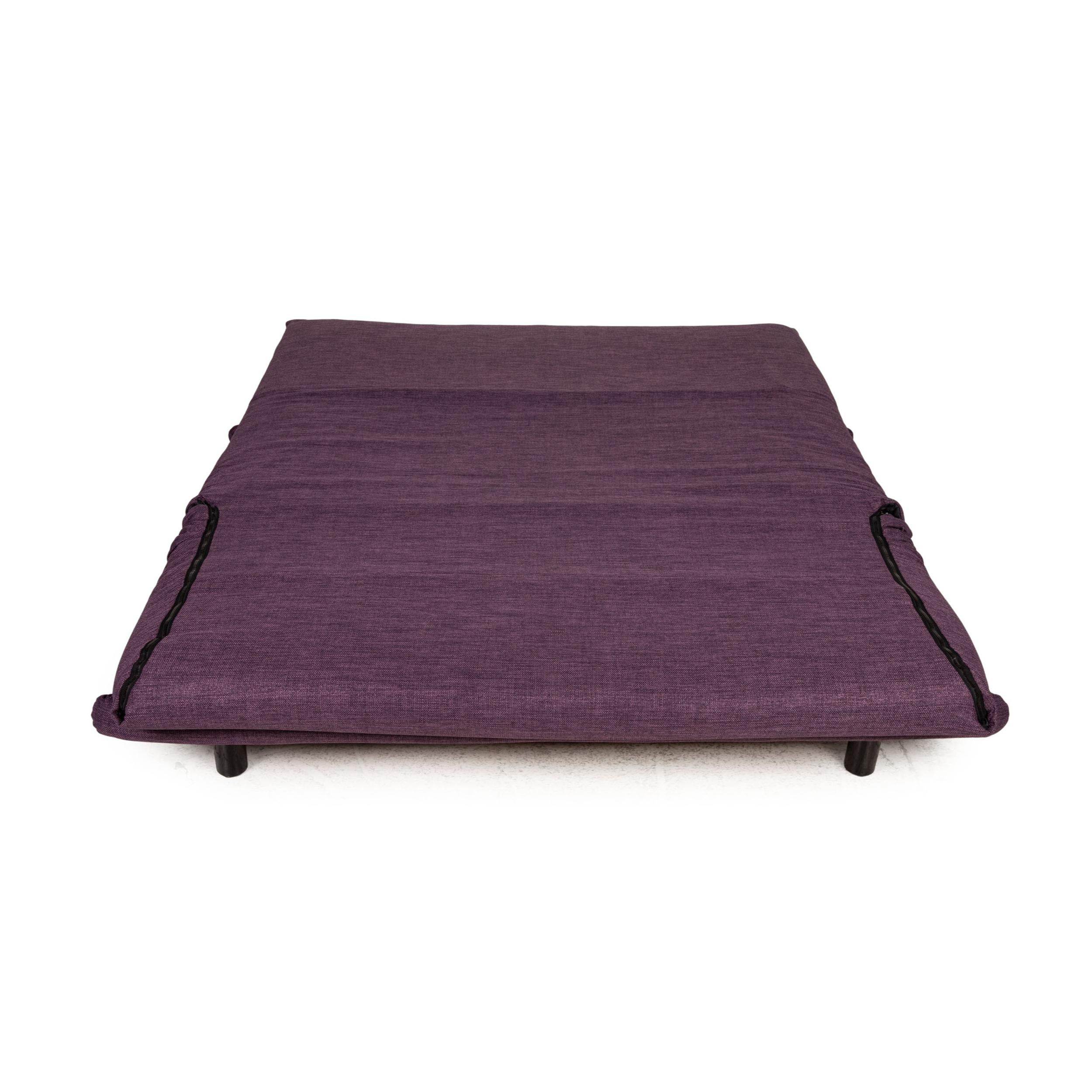 purple fabric sofa