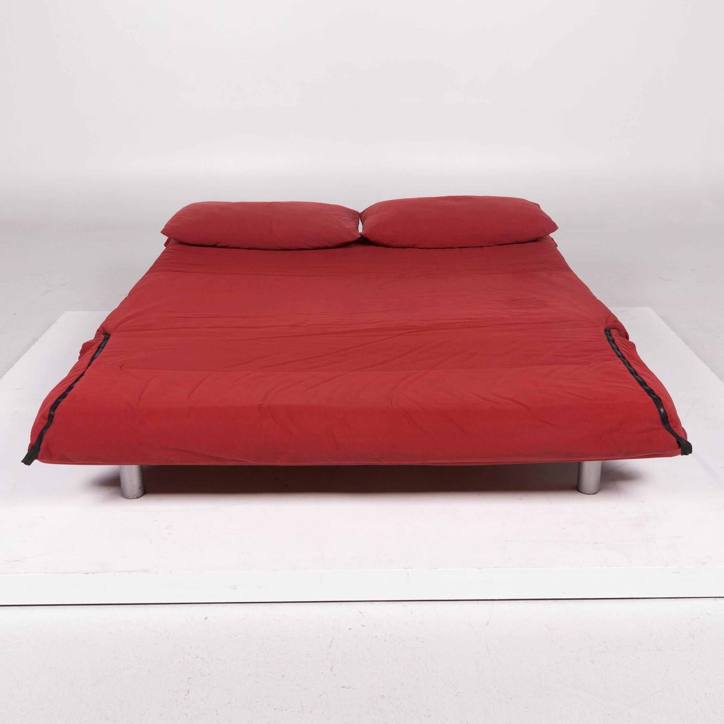 We bring to you a Ligne Roset Multy fabric sofa red two-seat sleeping function.


 Product, measurements in centimeters:
 

Depth 101
Width 166
Height 81
Seat-height 41
Seat-depth 66
Seat-width 166
Back-height 40.


 