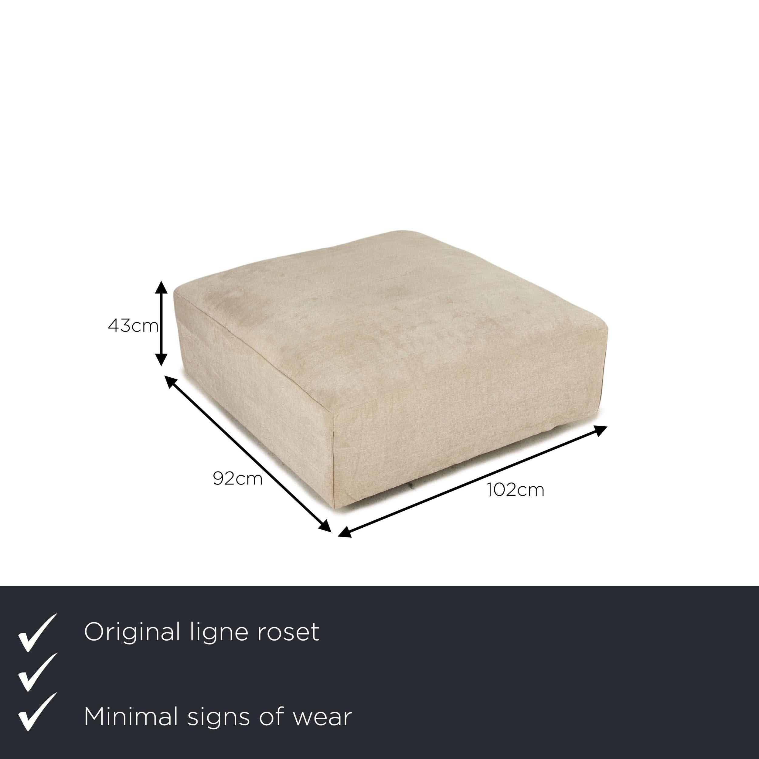 We present to you a Ligne Roset Nils fabric stool cream.
 

 Product measurements in centimeters:
 

Depth: 102
 Width: 92
 Height: 43.





  