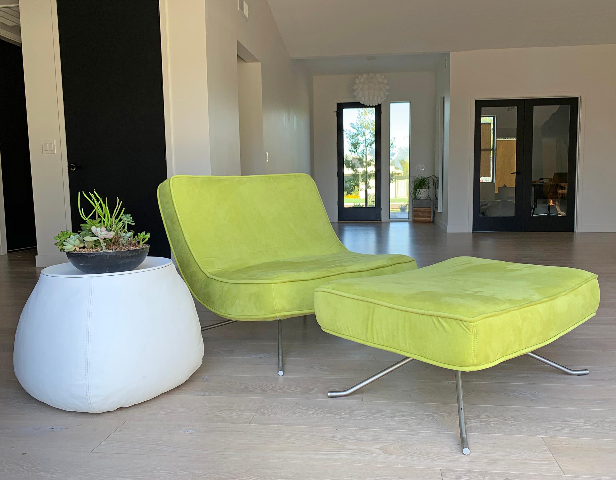 An absolutely stunning chair designed by Christian Werener for Ligne Roset, 2001. This lime green Pop Chair and ottoman feature curvy, clean lines with a modern feel. This transitional lounge chair would look incredible in almost any environment as