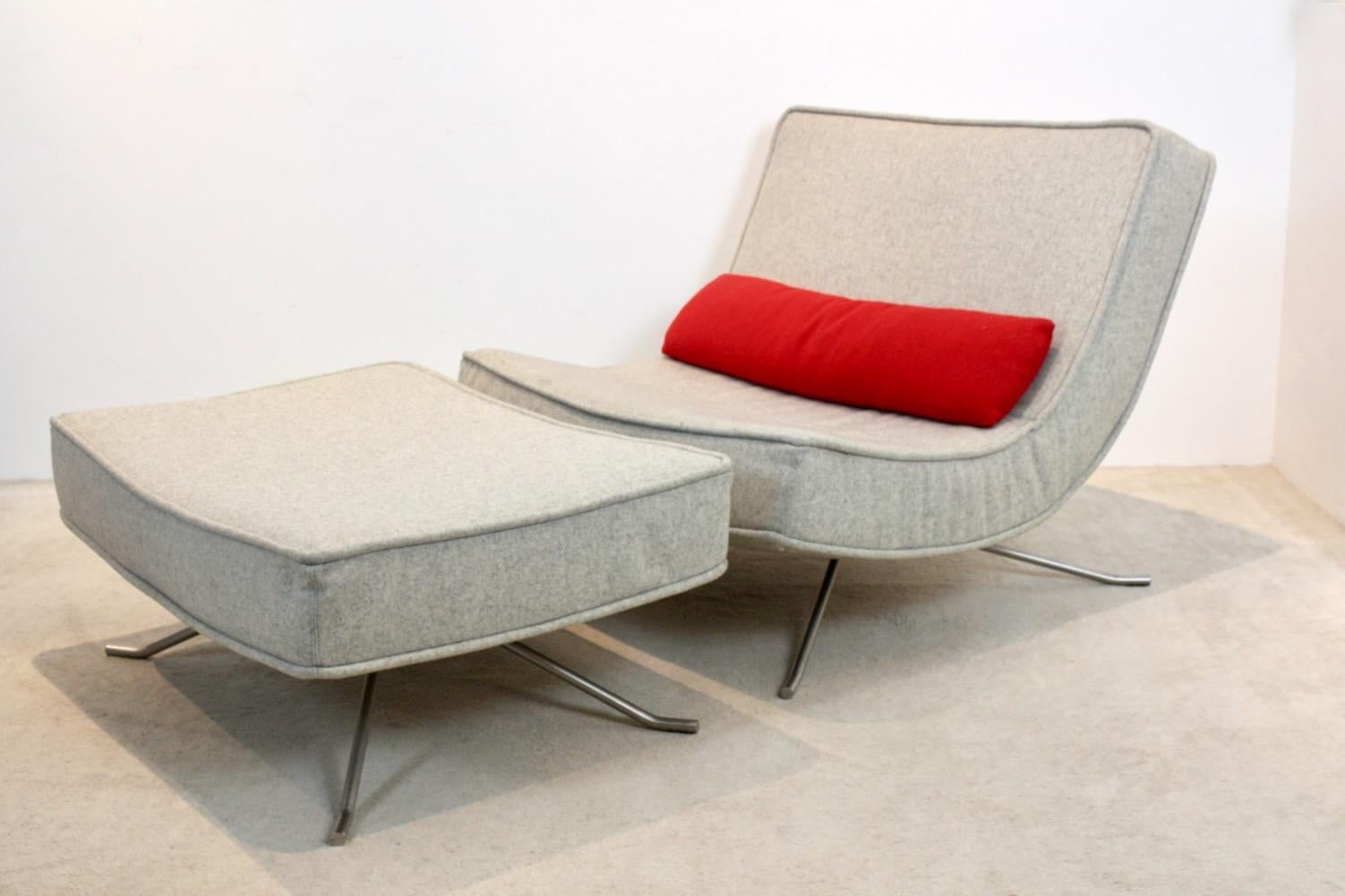 Iconic Lounge Chair and matching Ottoman designed by Christian Werner 1990’s and manufactured by French company Ligne Roset. The ‘Pop’ chair allows for extremely comfortable seating positions (even with two). The profile of the chair has soft curves