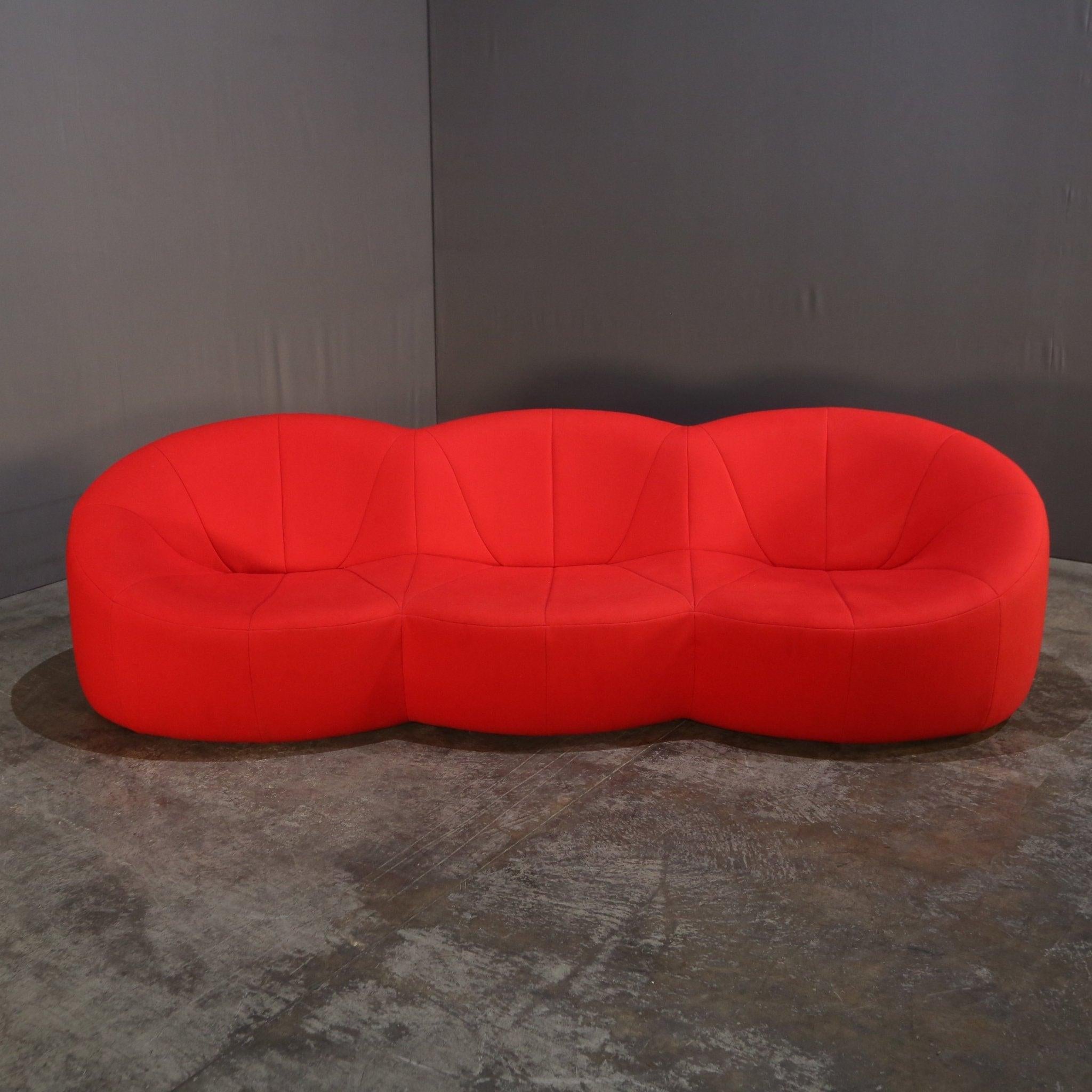 Introducing the Pumpkin Sofa by Pierre Paulin for Ligne Roset, a luxurious addition to any living space. This iconic piece features a unique, curved design that exudes elegance and comfort. Crafted with the highest quality materials, the Pumpkin