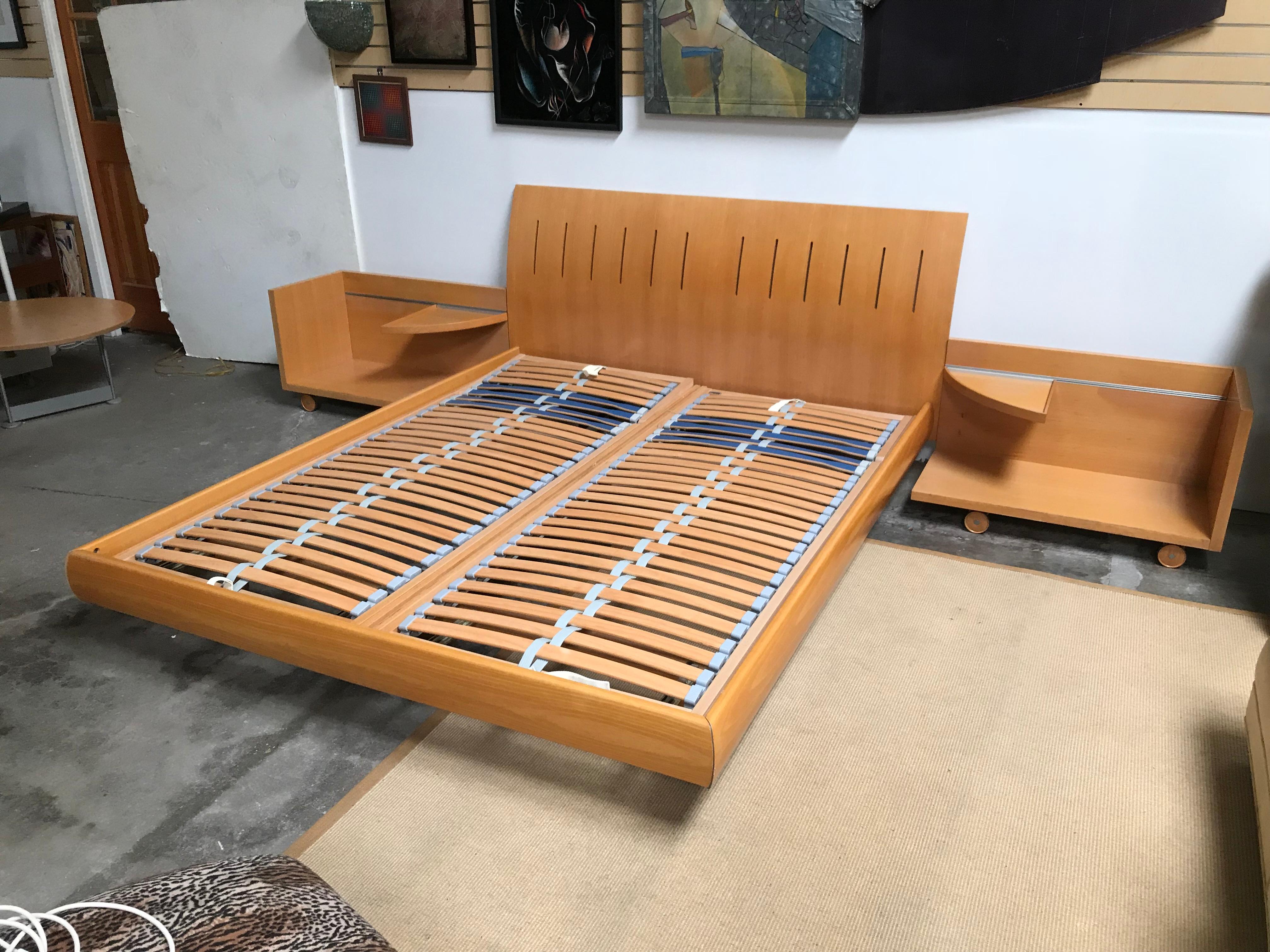 Contemporary maple wood platform bed set from French company Ligne Roset, with two side pieces on wheels. The platform is made of two twins beds inside the bed frame. A good way to sleep peacefully, without being disturb by one's partner!
Ligne