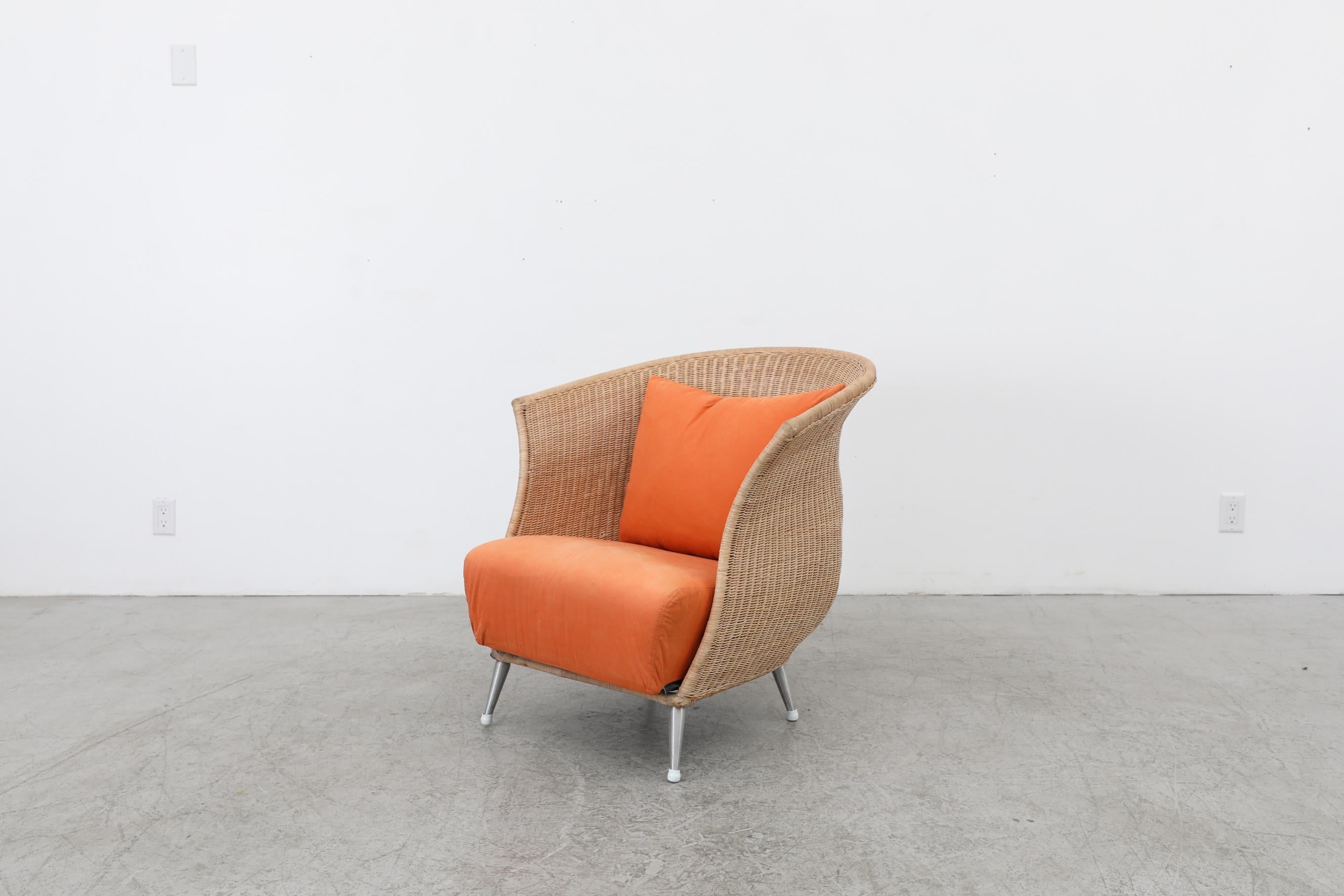 Mid-Century Modern Ligne Roset Organic Shaped Rattan Lounge Chair w/ Orange Cushions & Metal Feet For Sale