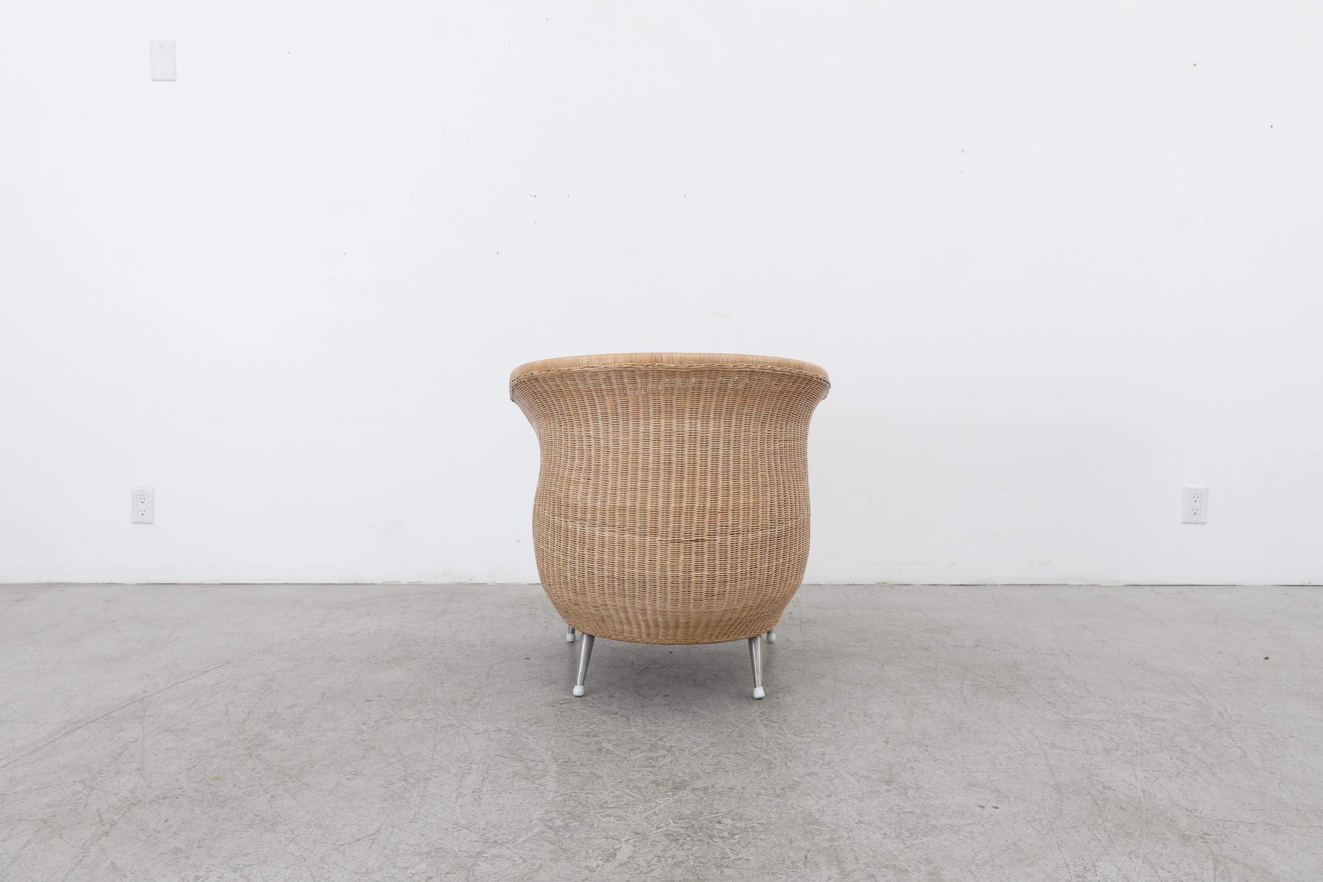 Contemporary Ligne Roset Organic Shaped Rattan Lounge Chair w/ Orange Cushions & Metal Feet For Sale