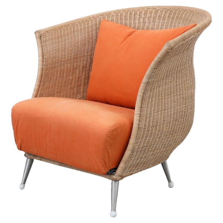 Ligne Roset Rattan Lounge Chair with Orange Cushion For Sale at 1stDibs