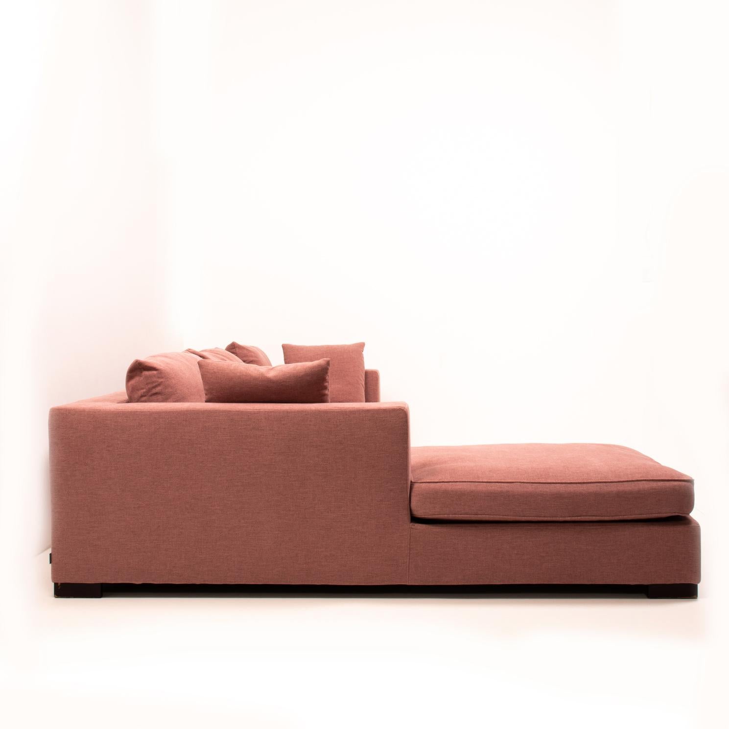 Classic and elegant, this Rive Gauche corner sofa was designed by Didier Gomez for Ligne Roset.

Comprising of two separate pieces, the sofa has a steel frame with ebony-stained oak feet, and has been newly reupholstered in soft dusty pink