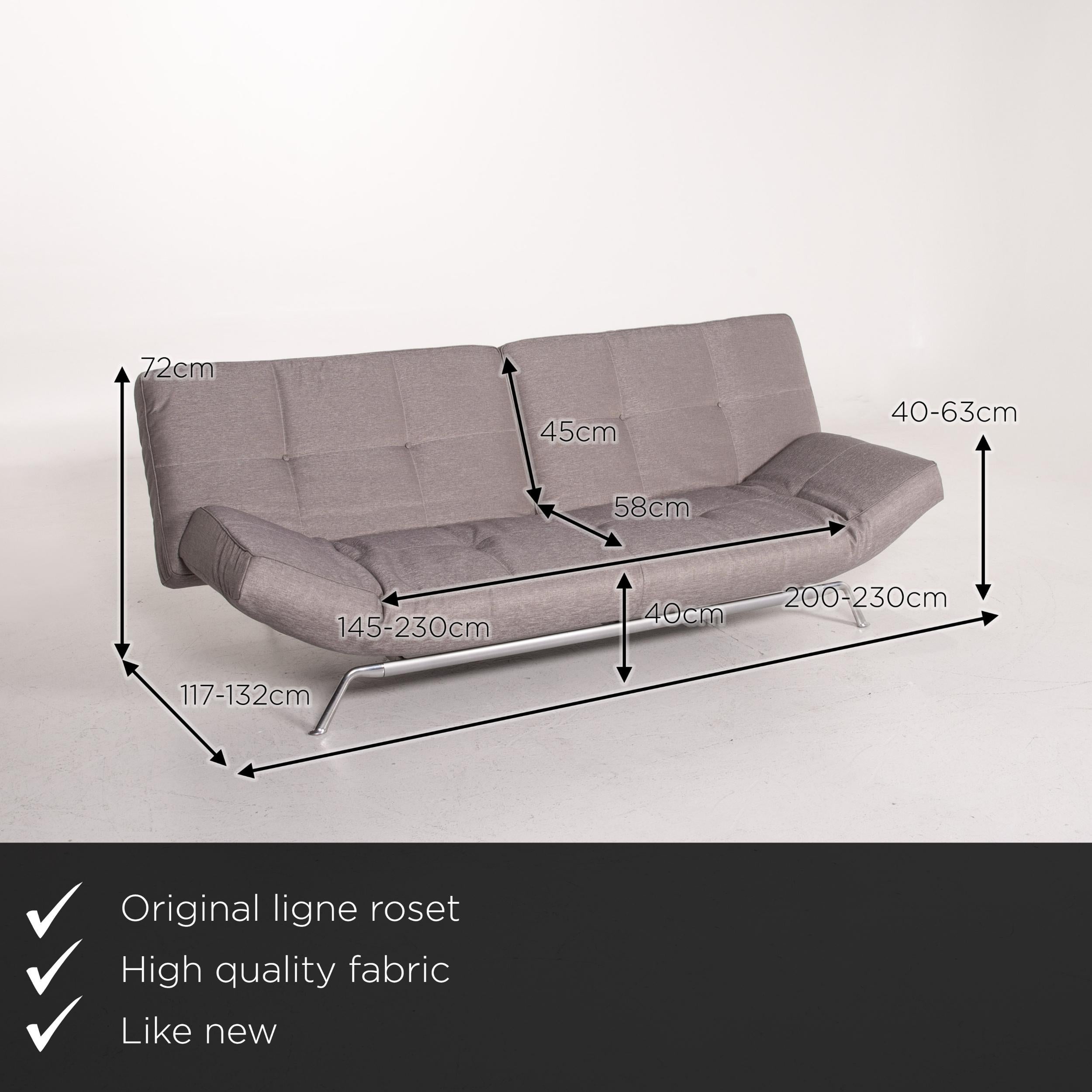 We present to you a ligne roset Smala fabric sofa gray silver three-seater function sleeping.

 

 Product measurements in centimeters:
 

Depth 117
Width 200
Height 72
Seat height 40
Rest height 63
Seat depth 58
Seat width 145
Back