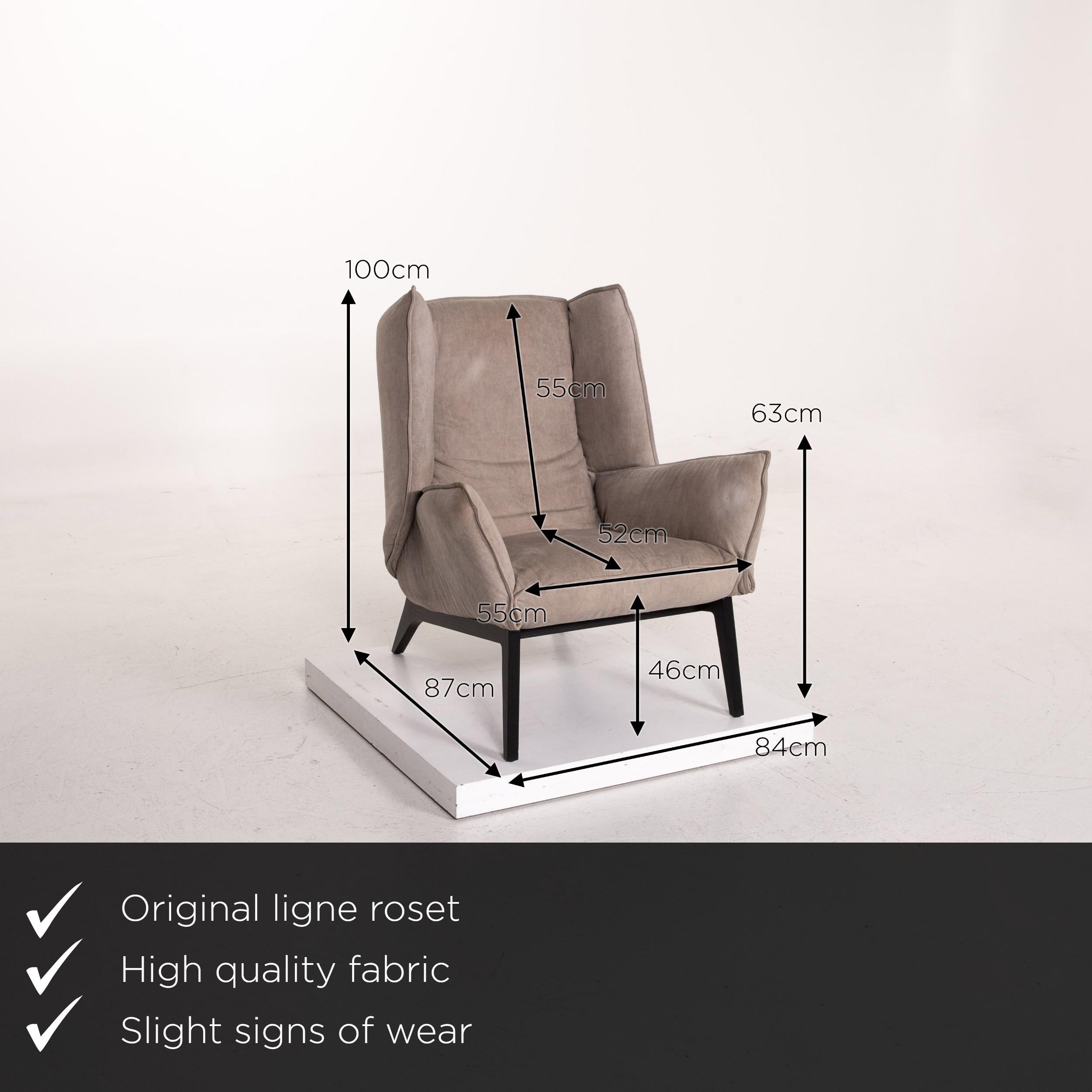 We present to you a ligne roset Toa fabric armchair gray Rémi Bouhaniche.
 

 Product measurements in centimeters:
 

Depth 87
Width 84
Height 100
Seat height 46
Rest height 63
Seat depth 52
Seat width 55
Back height 55.
 