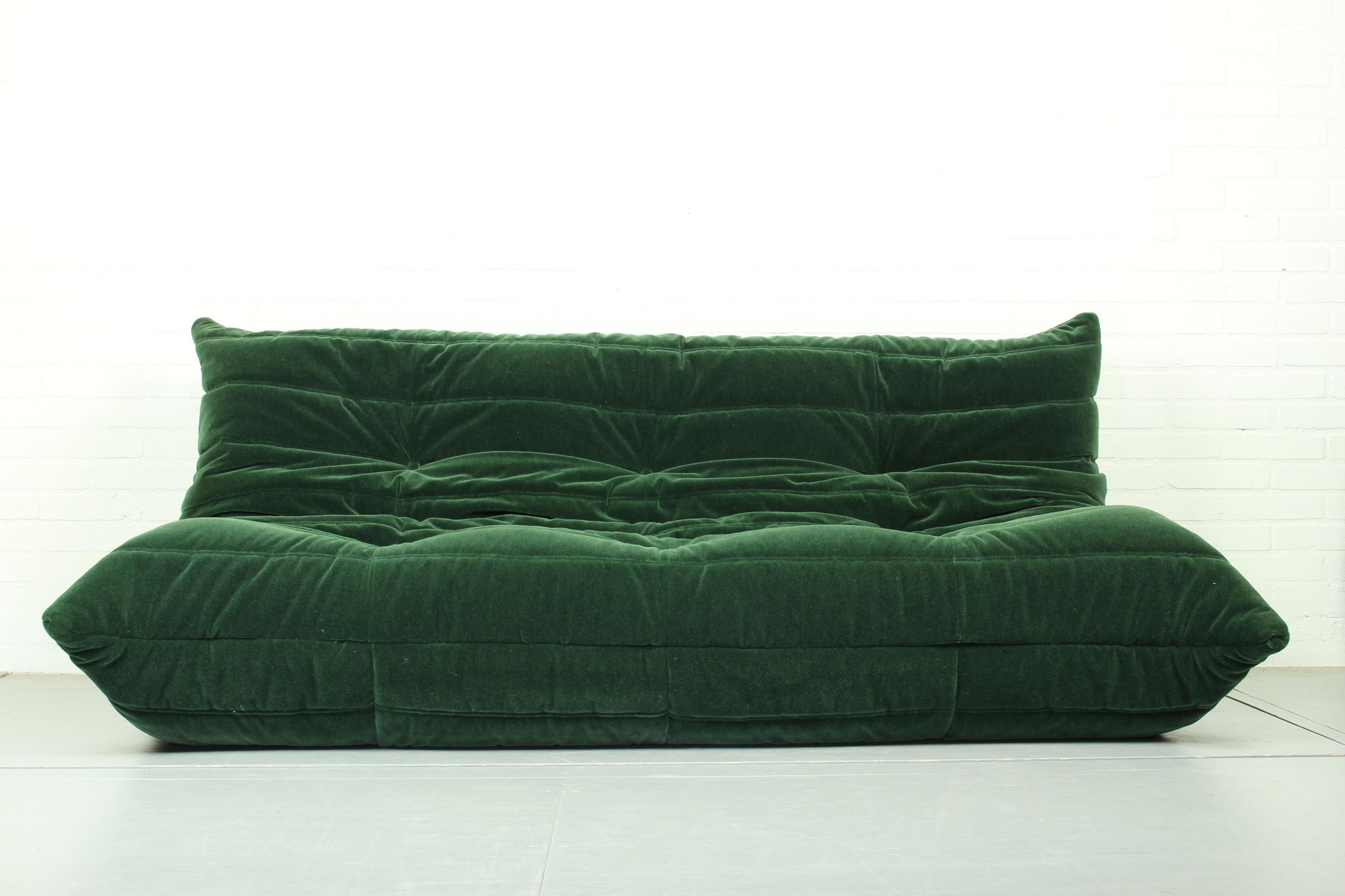 Togo sofa by Ligne Roset in excellent condition. Reupholstered in a high quality forrest green luxurious mohair supreme which gives a beautiful and rich effect. The Togo is The lounge sofa. It has an ergonomic design, multiple density polyether foam