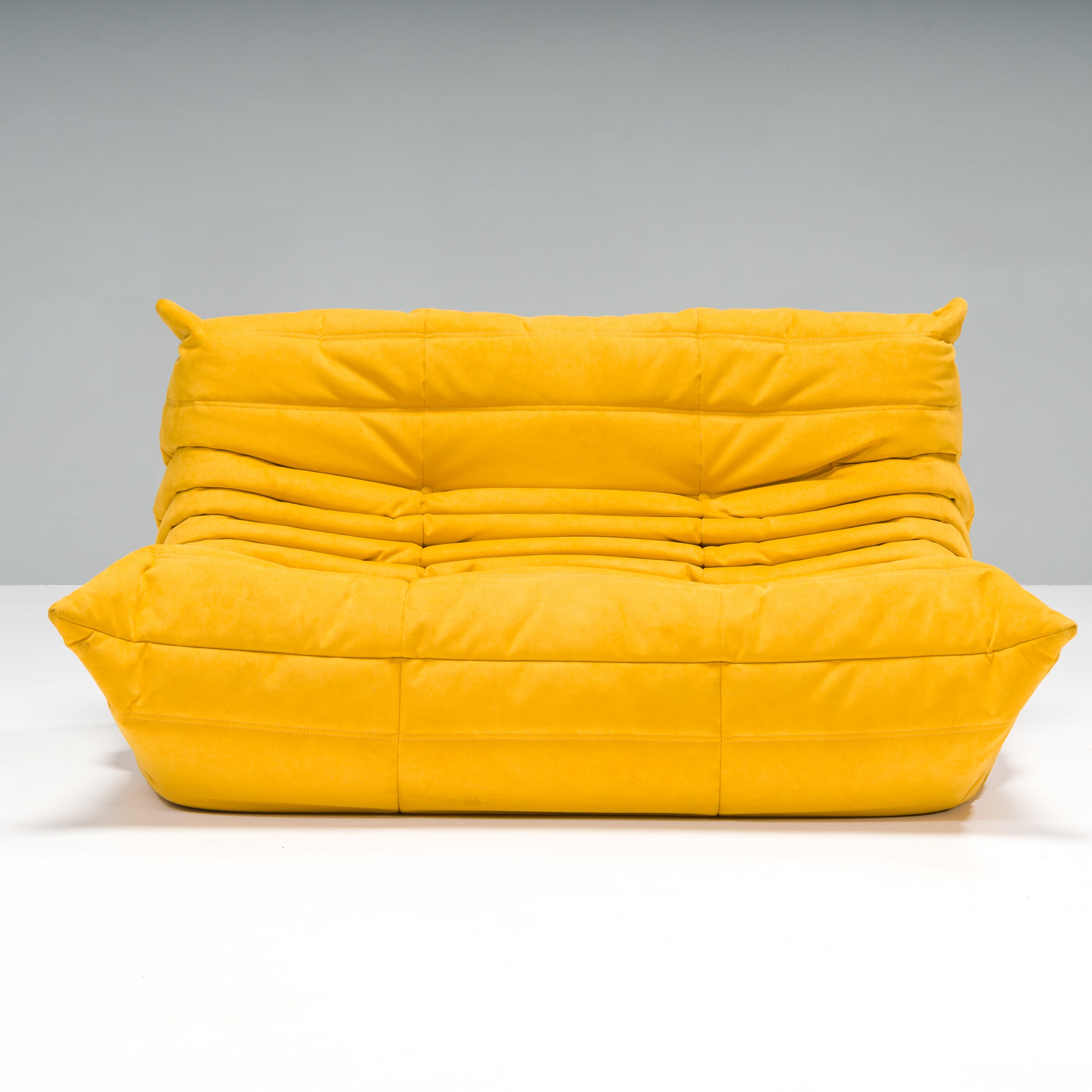 The iconic Togo sofa, originally designed by Michel Ducaroy for Ligne Roset in 1973, has become a design classic.

This sofa is incredibly versatile and can be used alone or paired with other pieces from the range. The piece features the instantly