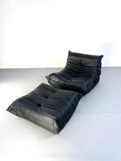 Ligne Roset Togo Set: 1-Seater Armchair and Pouf in Black Leather Iconic Design