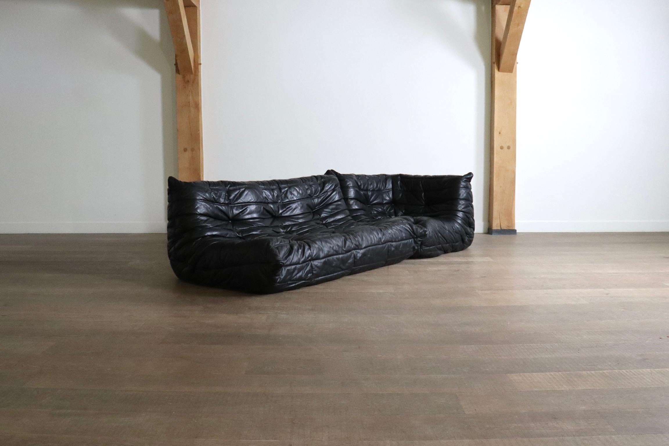 Amazing Ligne Roset Togo sofa set in original black leather by Michel Ducaroy, 1988.

This iconic design by renowned French designer Michel Ducaroy has gained popularity over the years, due to its timeless style. The lightweight elements combined