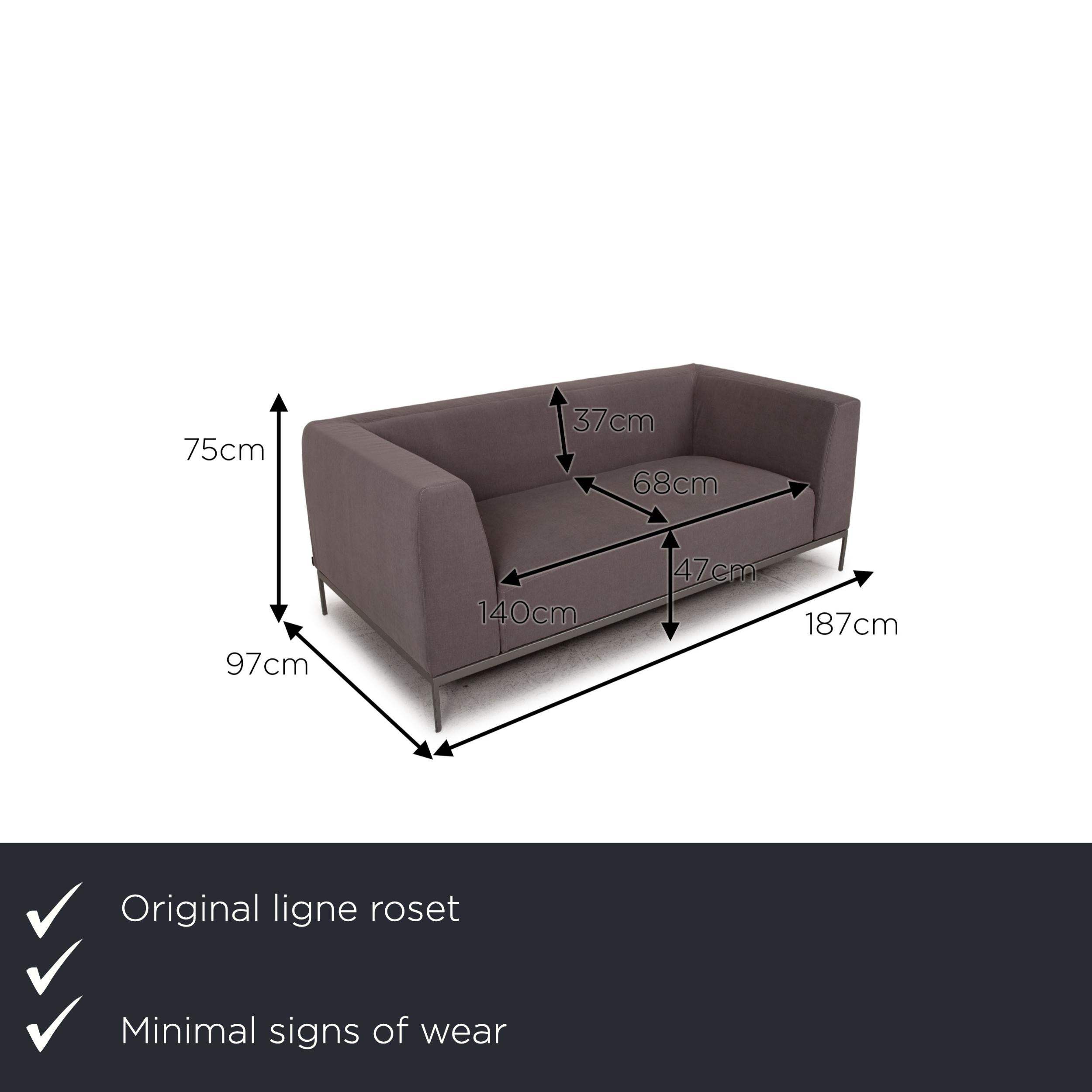 We present to you a ligne roset traversal fabric sofa gray two-seater couch.

Product measurements in centimeters:

Depth: 97
Width: 187
Height: 75
Seat height: 47
Rest height: 75
Seat depth: 68
Seat width: 140
Back height: 37.

   