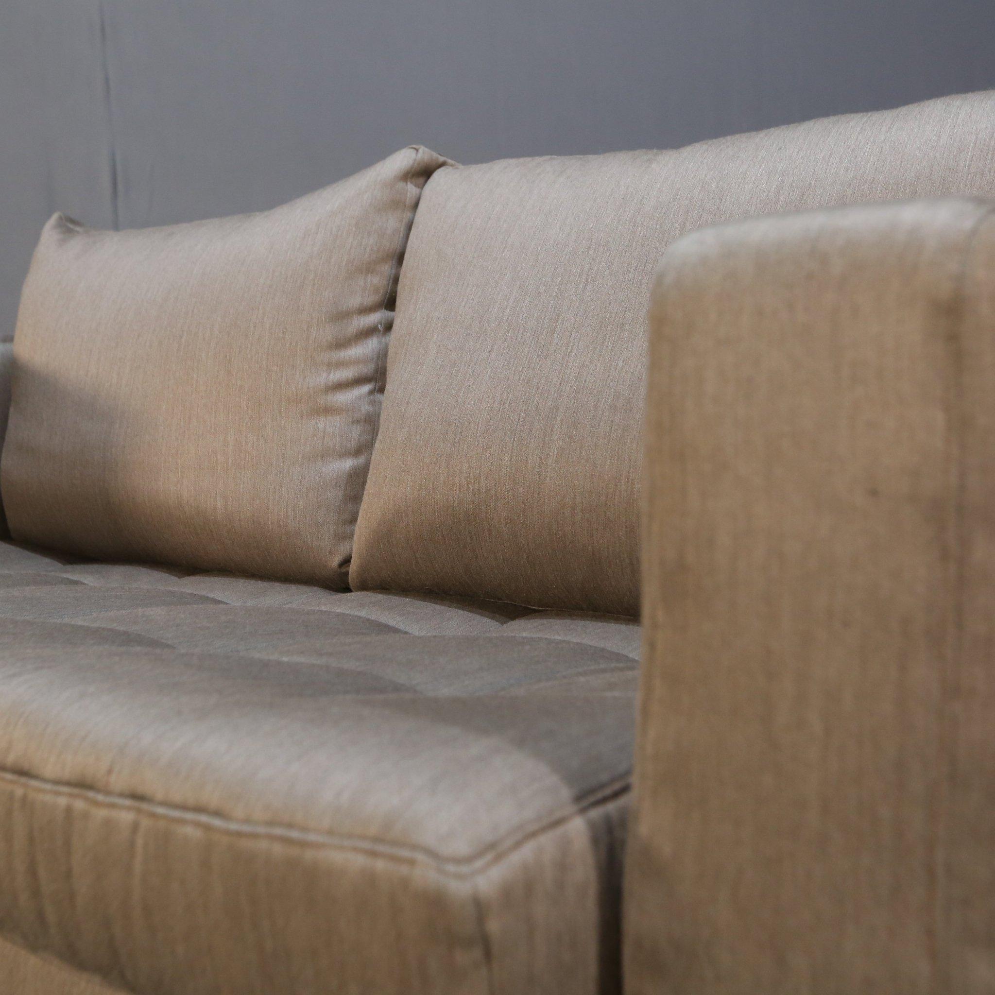 Introducing the stunning Two Seater Sofa by Ligne Roset, a must-have piece for any modern living space. Crafted with the highest quality materials, this sofa boasts a sleek and contemporary design that will elevate any room. The sturdy metal legs