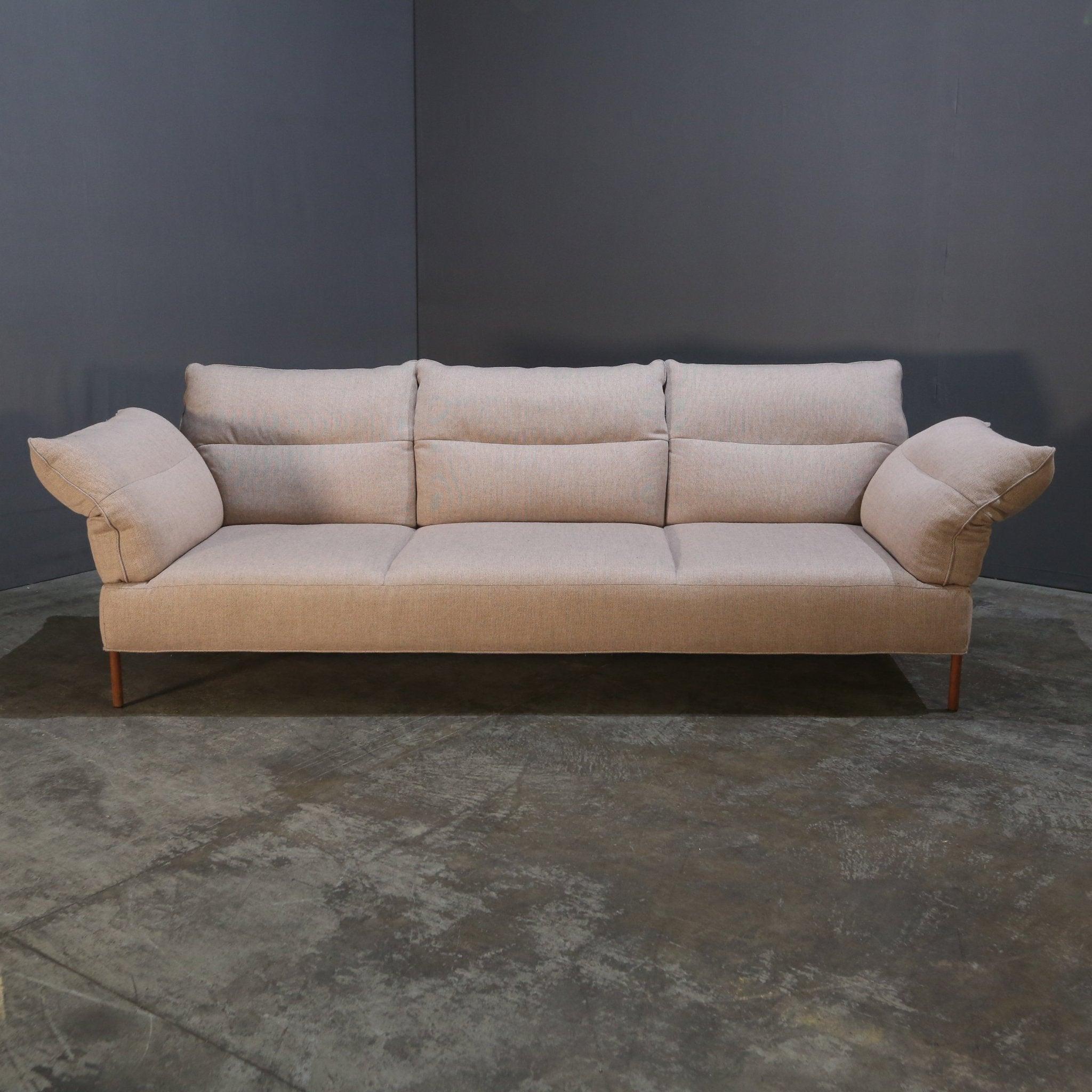 Introducing the stunning Two Seater Sofa by Ligne Roset, a must-have piece for any modern living space. Crafted with the highest quality materials, this sofa boasts a sleek and contemporary design that will elevate any room. The sturdy metal legs