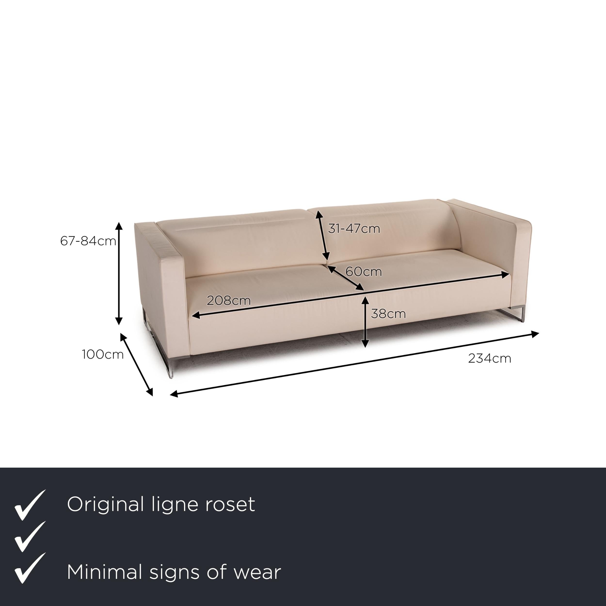 We present to you a ligne roset Urbani fabric sofa cream three-seater couch function.
  
 

 Product measurements in centimeters:
 

 depth: 100
 width: 234
 height: 67
 seat height: 38
 rest height: 67
 seat depth: 60
 seat width: