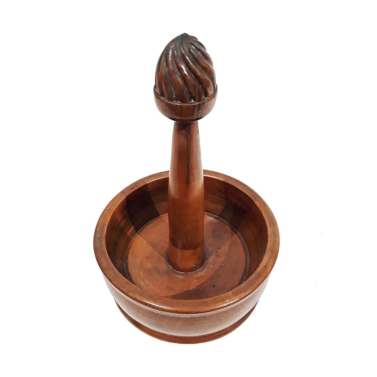 A turned lemon squeezer, crafted off a single block of Lignum Vitae wood, from the Carter Burden Jr. personal collection. 

Carter Burden Jr., (1941-1996), New York famous philanthropist, politician and socialite, gathered many exquisite