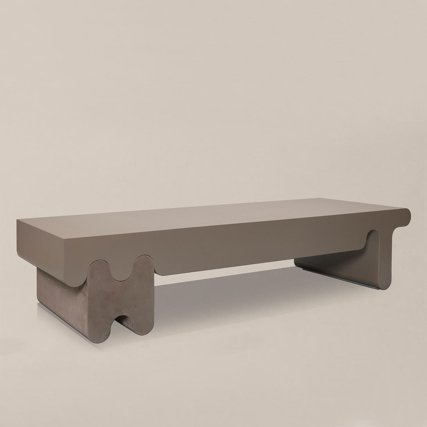 Coffee table liguria leather with solid wood structure, 
with covered top in genuine leather in smoke color finish,
and with base covered in italian suede leather in smoke 
color finish.
Also available in other suede colors on request.