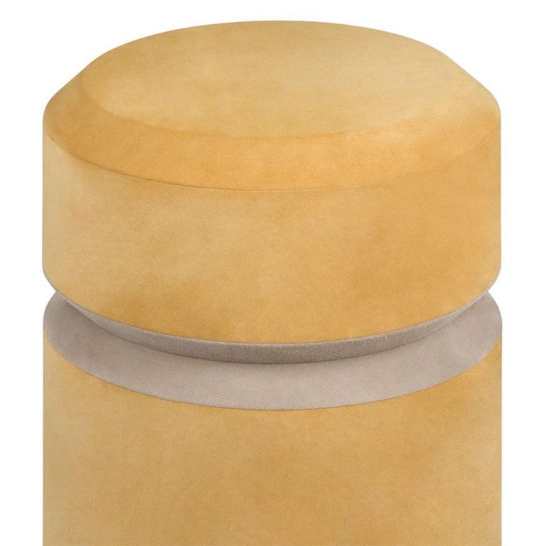 Stool Liguria medium with solid wood structure covered with 
suede genuine leather in mustard finish. Trim in suede genuine 
leather in light grey finish. Also available with other leather color
finishes on request.