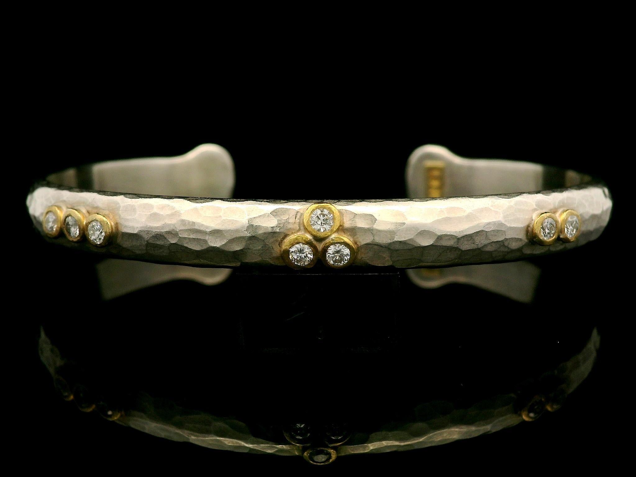 --Stone(s):--
(8) Natural Genuine Diamonds - Round Brilliant Cut - Bezel Set - Nice White Color - 0.28ctw (approx.)

Material: Sterling Silver - High Karat Yellow Gold
Weight: 18.78 Grams
Type: Cuff Bangle Bracelet
Length: Will comfortably fit up to
