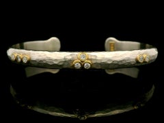 Lika Behar Brazalete abierto Estocolmo de plata y oro amarillo 0,28 quilates de diamantes