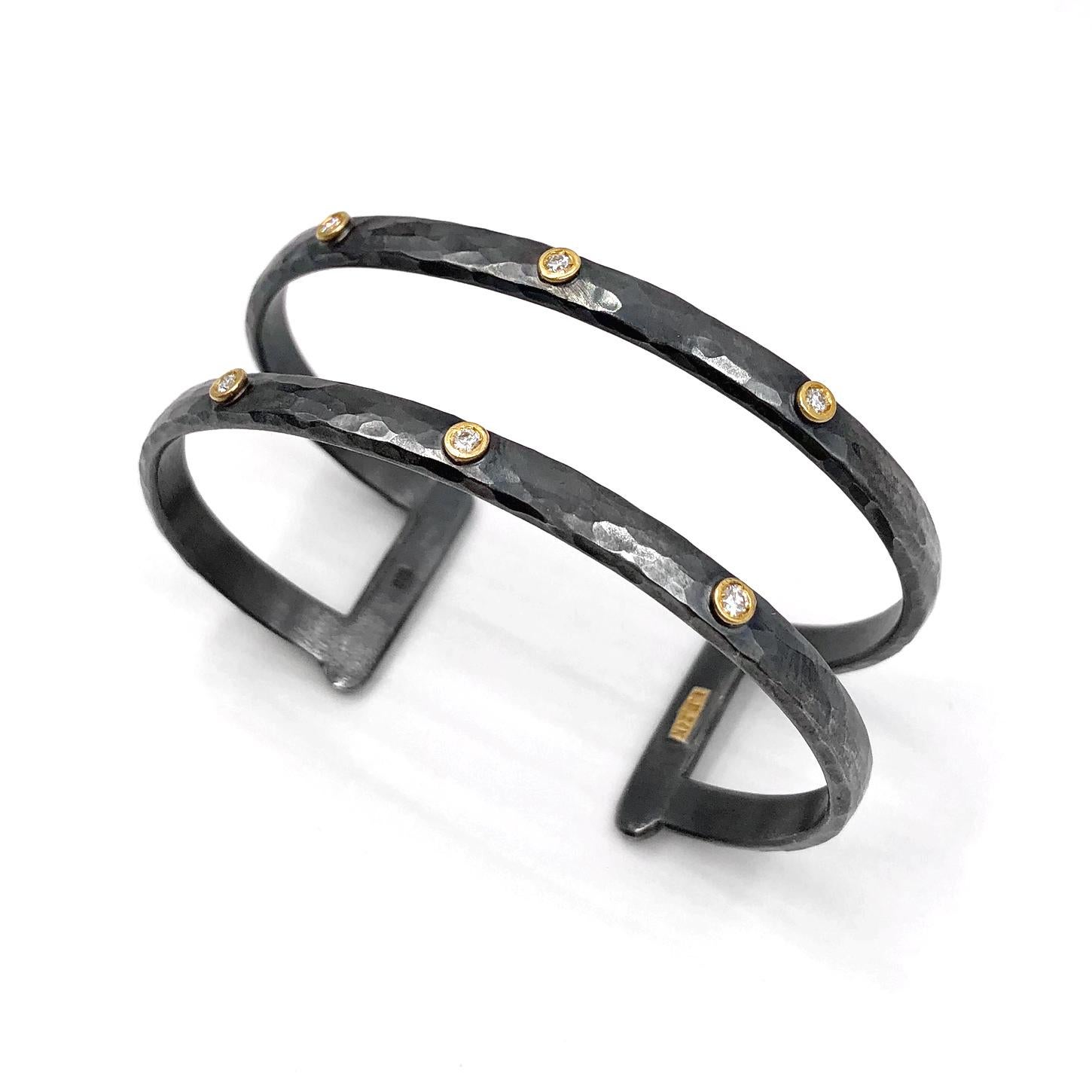 Double Open Cuff Bracelet handcrafted by acclaimed jewelry artist Lika Behar featuring six round brilliant-cut white diamonds totaling 0.20 carats, individually bezel-set in 24k gold and attached to an oxidized sterling silver cuff.  Stamped LIKA