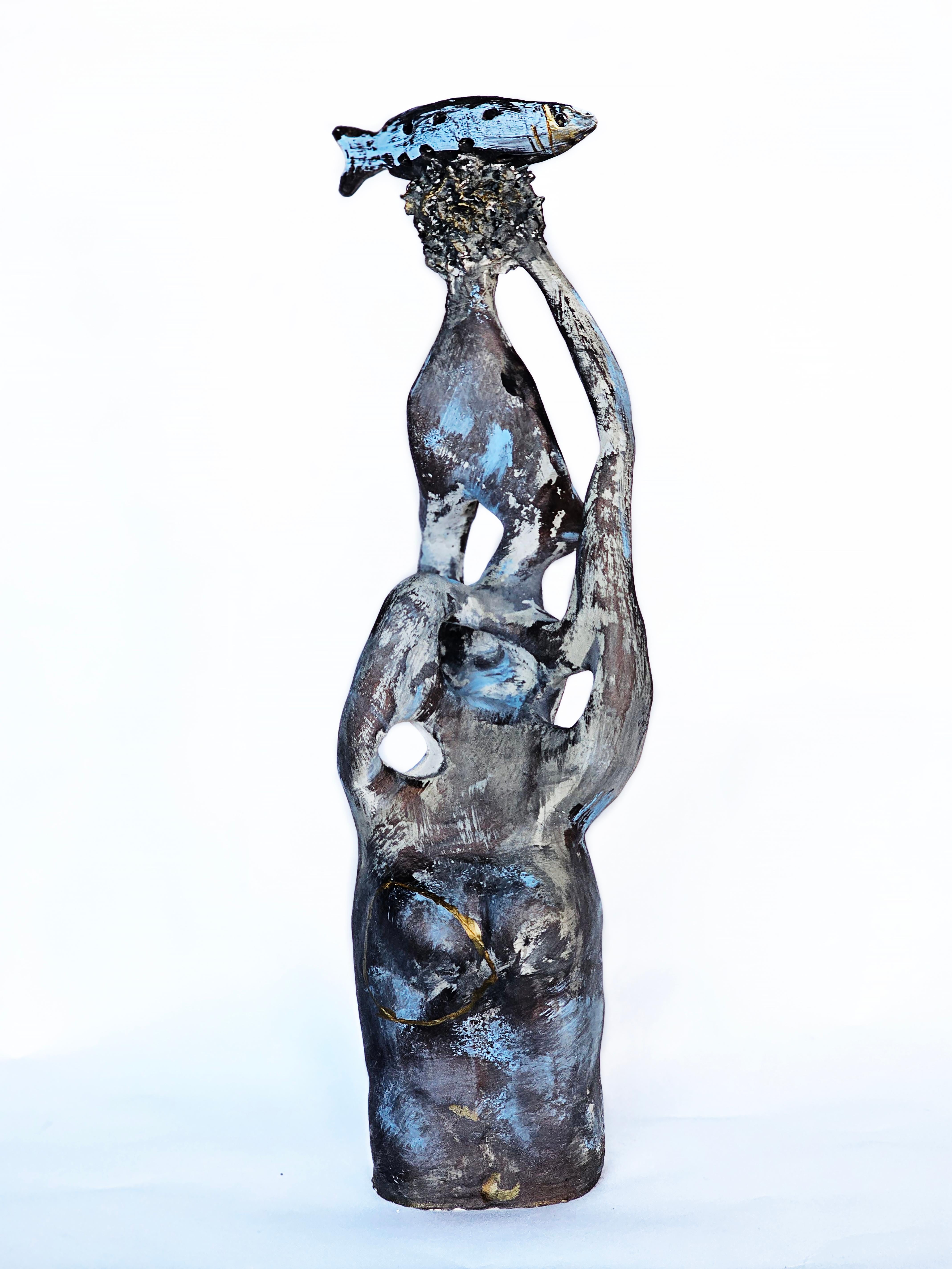 "Zuza" Ceramic Sculpture 22" x 6" inch by Lika Brutyan

Medium: Clay, underglaze

Lika Brutyan is American photographer, was born in a family of scientists and artists in Yerevan, Armenia. 
Her training and work in psychotherapy has lead her to a