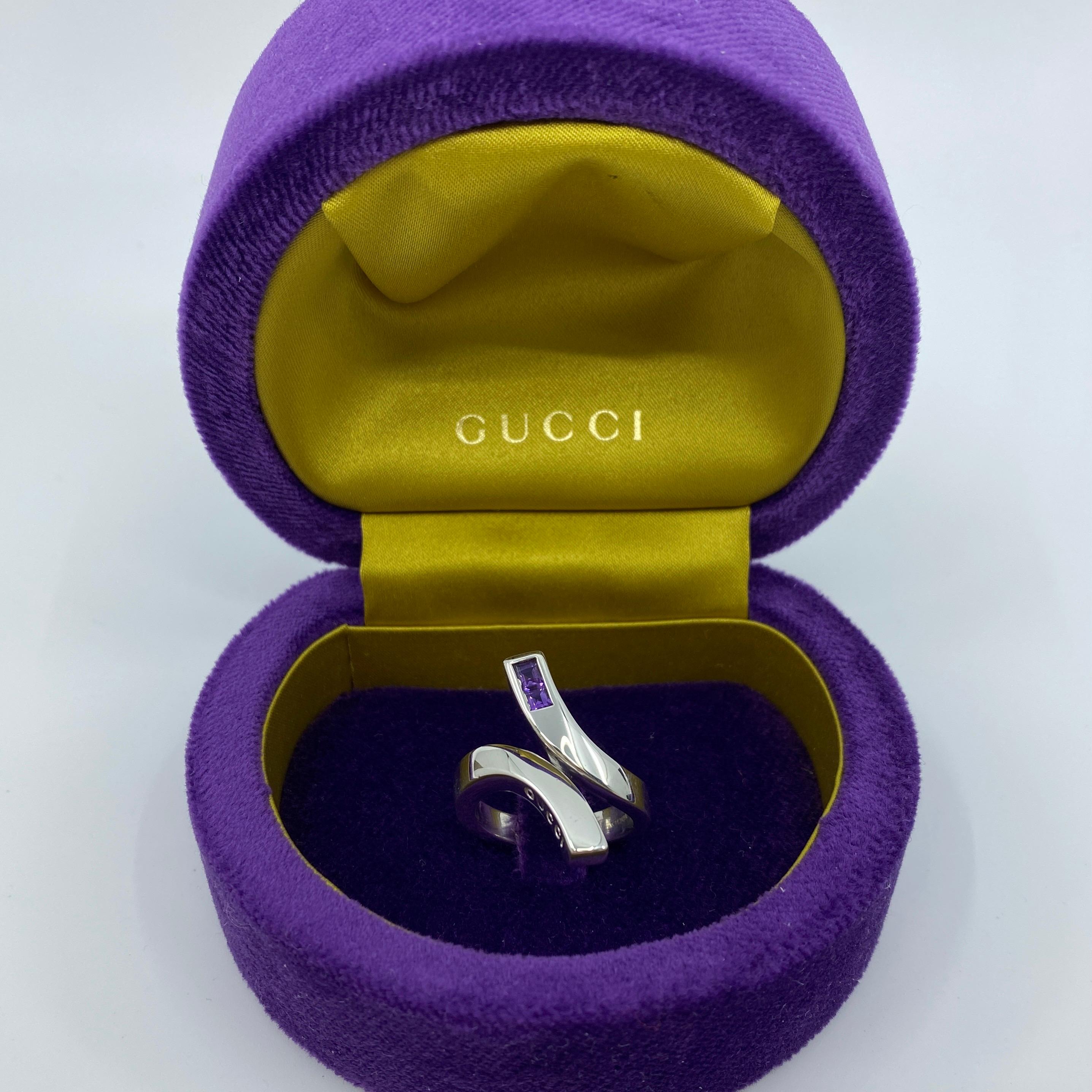 Gucci silver twirl ring set with 2 fine quality princess/square cut amethysts. Comes with original Gucci box.

Used item, some minor scratches on it. Has been professionally cleaned and polished so very bright and shiny. Like new.

Ring size N1/2/