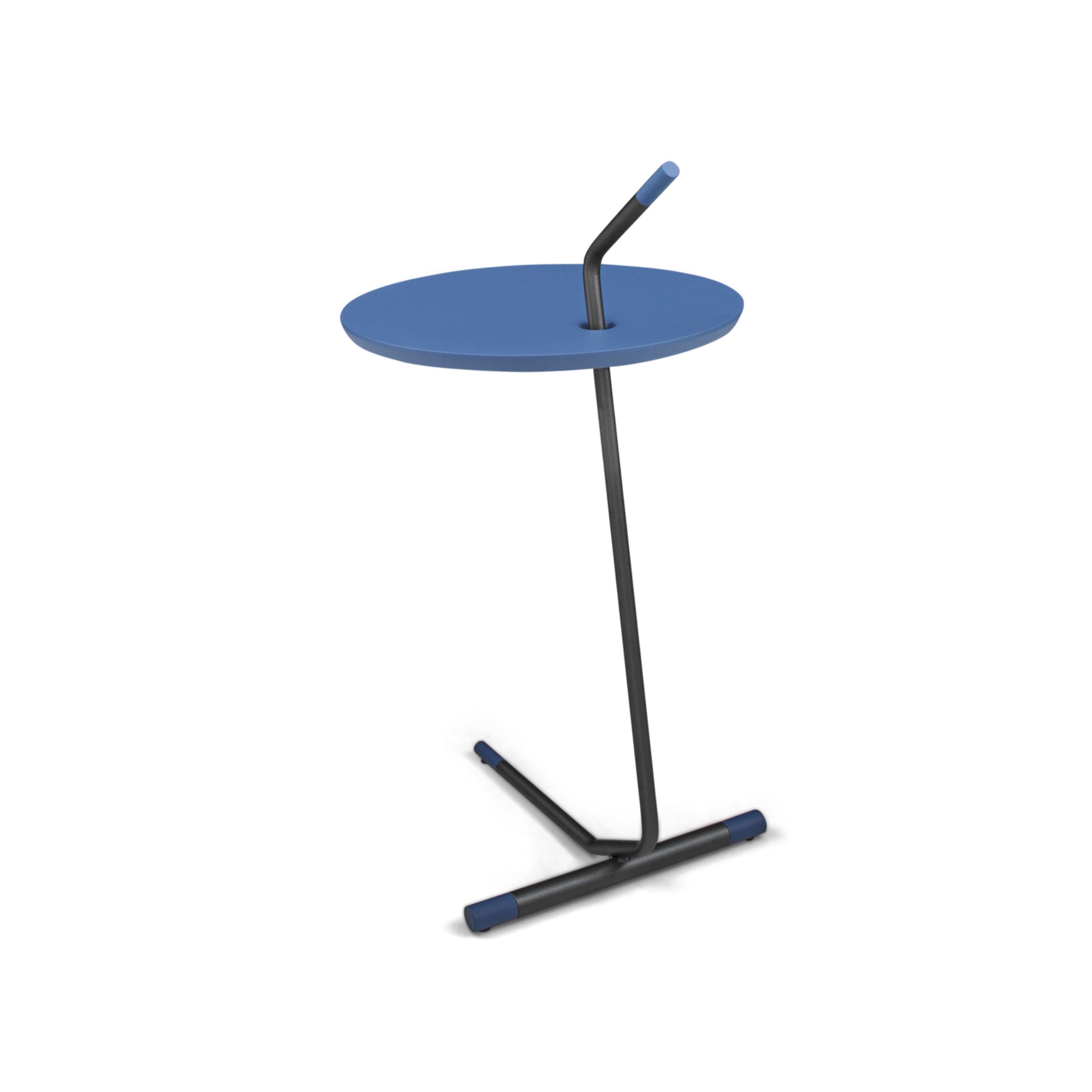 The like side table features an MDF wood top in a blue finish and a metal base. This table is made of parallels, giving a distinctive shape and an unconventional look. This table features a light pink wood finish and the metal will attract all the