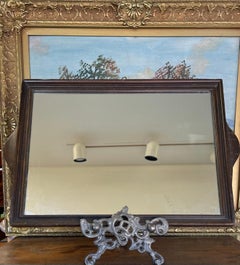 Likely Antique Arts and Crafts Wandspiegel mit geschnitztem Holzrahmen