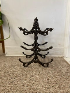 Likely Antique Cast Iron Scrollwork Fireplace Log Holder with Victorian Styling