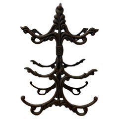Likely Antique Cast Iron Scrollwork Fireplace Log Holder with Victorian Styling Likely Antique Cast Iron Scrollwork Fireplace Log Holder with Victorian Styling