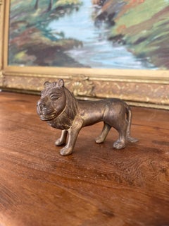 Likely Antique Possibly Hand-Cast Bronze Toned Lion Figurine.