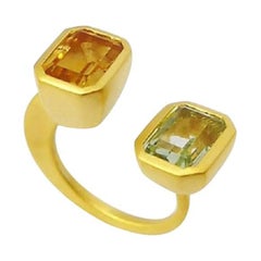 Lila-Ring mit Citrin und Peridot aus 18 Karat Gold
