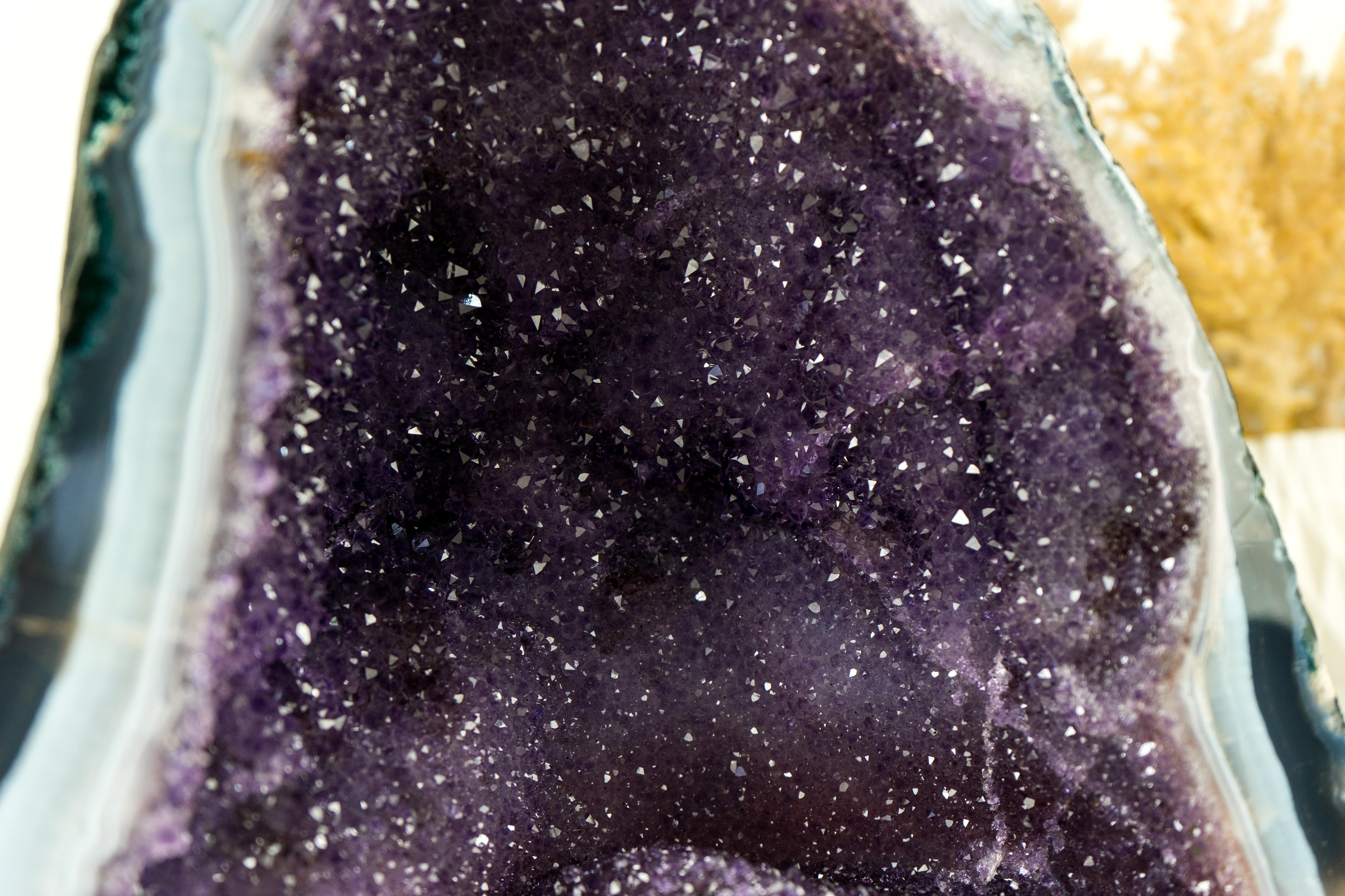 Fabulously formed, this natural Agate Geode is a natural artwork that brings many rare characteristics that will stand out in your mineral collection or add a touch of elegance to your home or office decor.

Resembling a sky filled with stars at