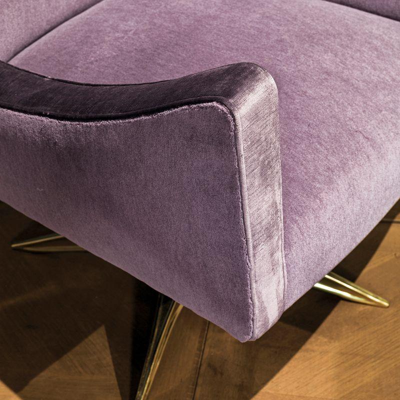 A lavish and shimmering lilac jacquard fabric upholsters the capacious and sumptuous shape of this extraordinary armchair, a one-off design of unparalleled sophistication. Resting on a brass swivel base, it will take center stage in both modern and