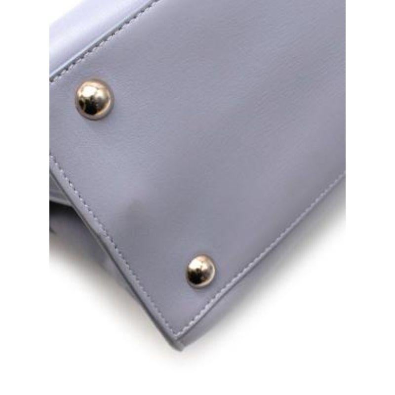 Fliederfarbene Gancini-Ledertasche mit Schnalle im Angebot 3