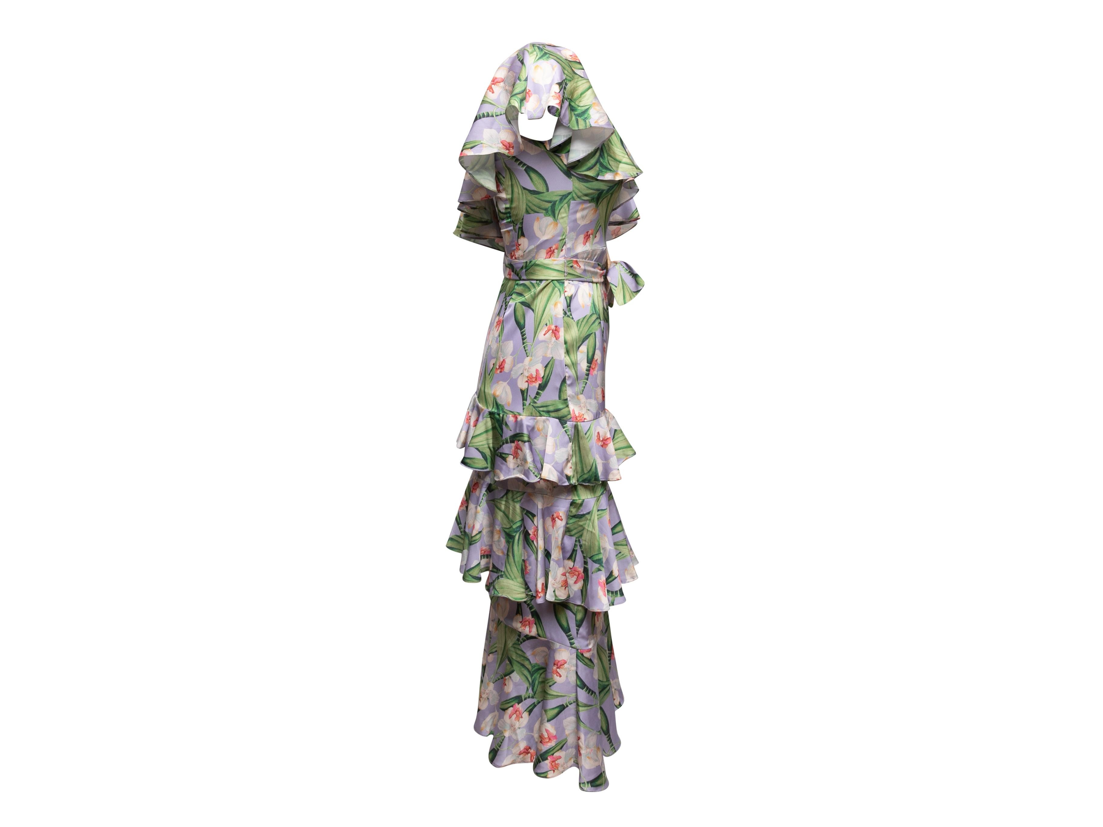 Lilac and multicolor floral print one-shoulder tiered ruffle dress by Patbo. Belt at waist. Zip closure at side. 26