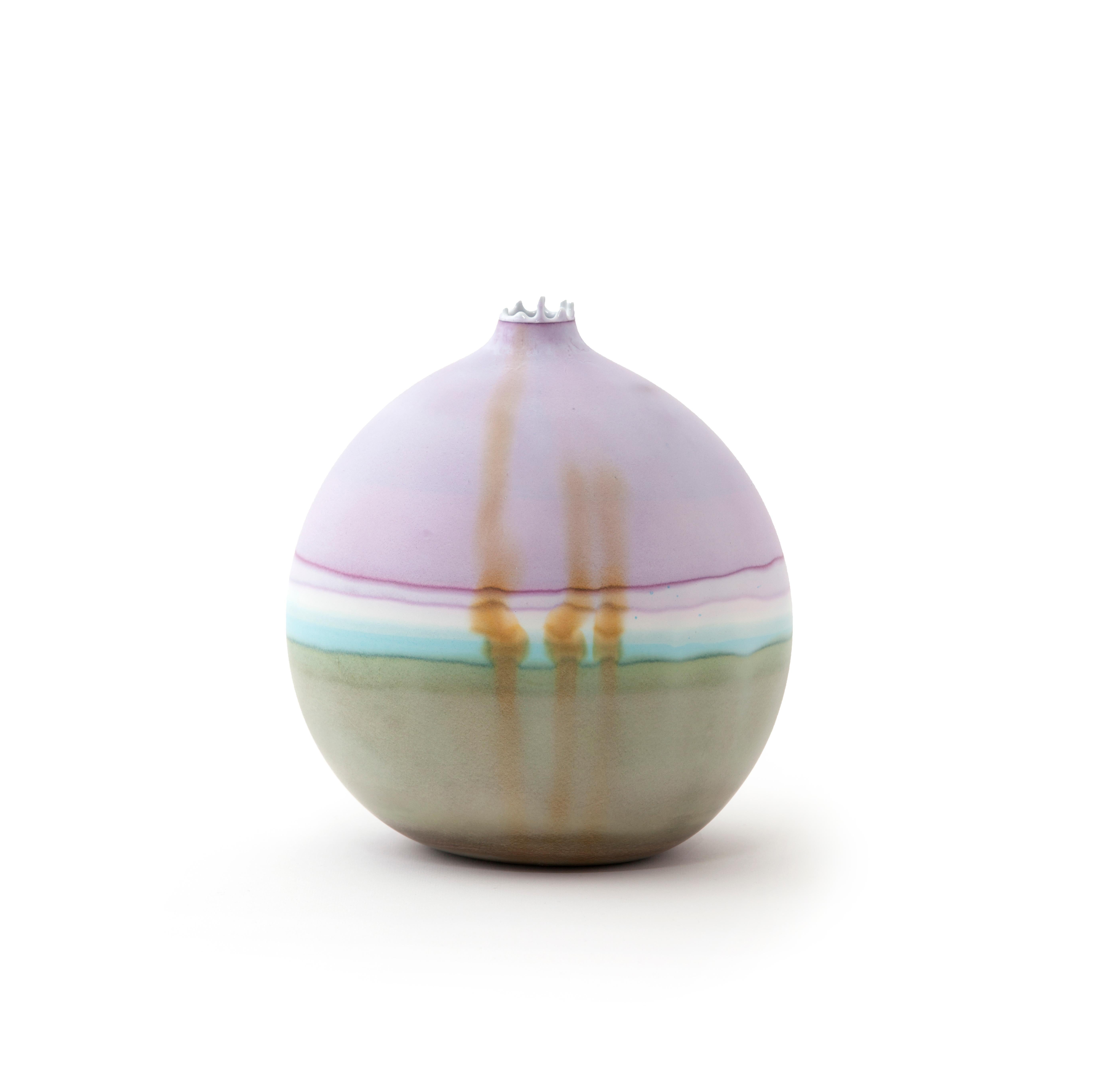 Lilac Patina saturn vase by Elyse Graham
Dimensions: W 20 x D 20 x H 23 cm
Materials: Plaster, Resin
Molded, dyed, and finished by Hand in LA. Customization
Available.
All pieces are made to order

This collection of vessels is inspired by