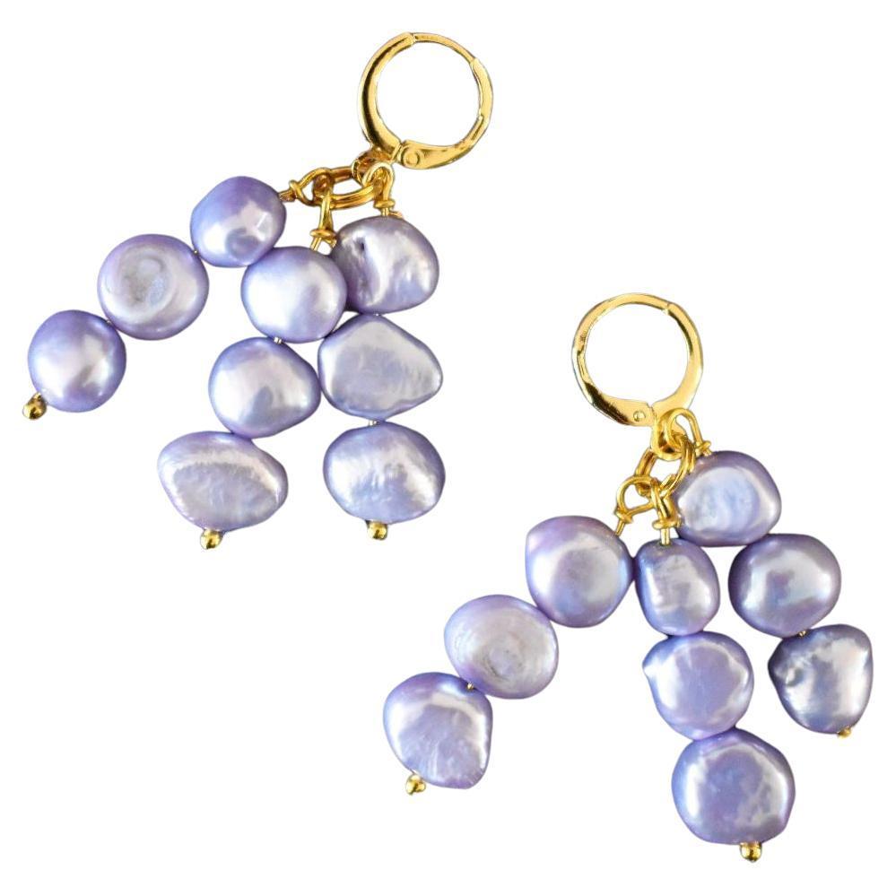 Called Igi meaning trees, these popular minimalist purple pearls are a must have member of your modern pearl collection. Lilac purple pearls have a beautiful shimmer and striking in nature yet lightweight to wear.


DETAILS
Brand: Ifemi