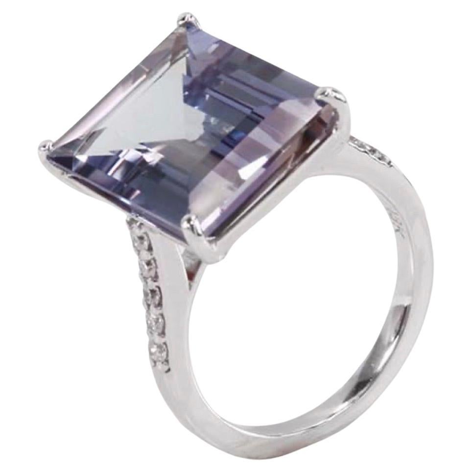 Lilac Tanzanite & Diamond  Ring

Creator: Carson Gray Jewels
Ring Size: 6.5
Metal: 18KT White Gold
Stone: Tanzanite & Diamonds
Stone Cut: Baguette
Weight: Tanzanite is 11.28 carats; 0.23 carats of diamonds
Style: Statement Ring


This exceptional