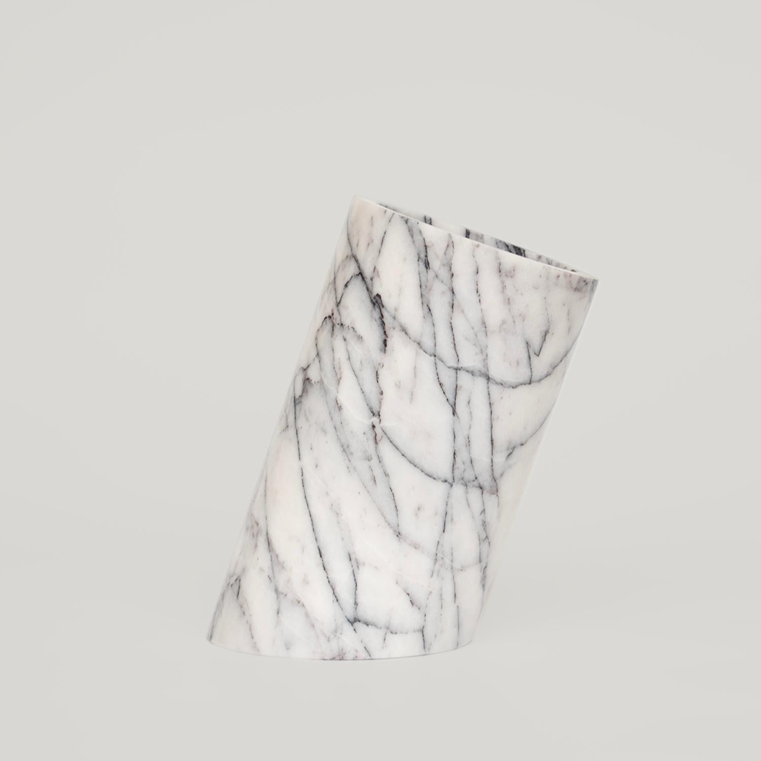 Our wine cooler is designed by us and hand crafted by the artisans within the fair-trade principles.

The natural properties of the marble will keep your wine chilled with no need for ice - you can also place this marble cooler in the fridge for an