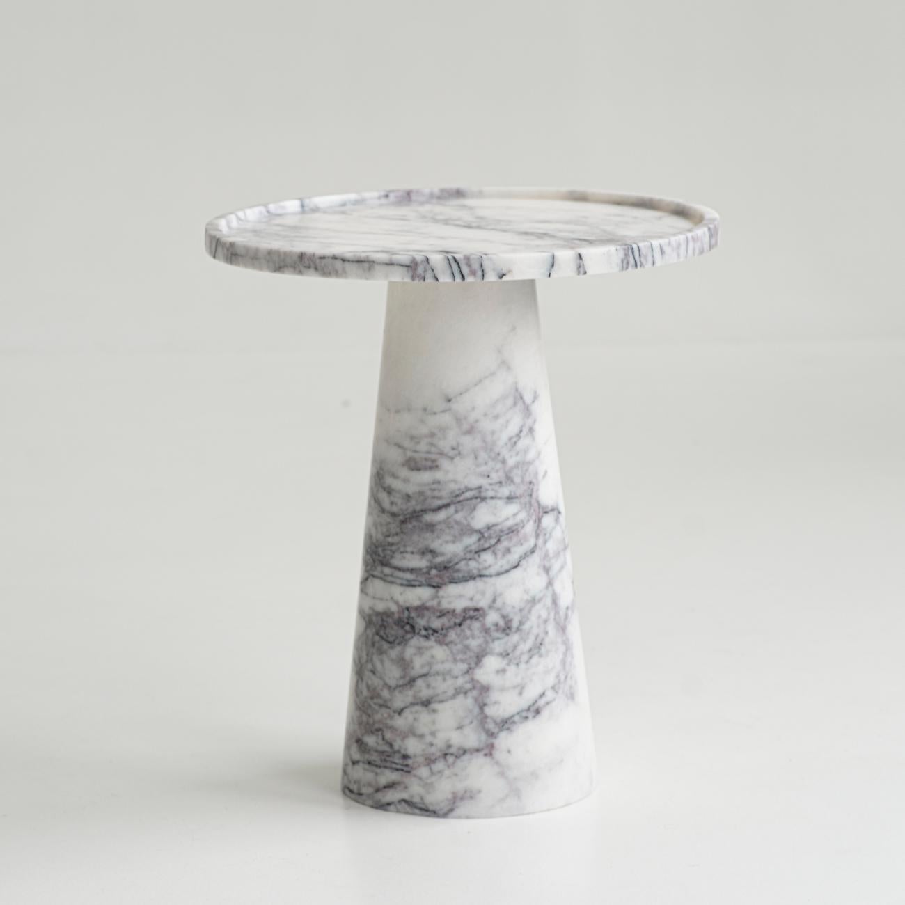 Lilac Pedestal Side Table made from white marble with lilac purple veins. 

Stunning, aesthetic, timeless are words that can be used to describe this elegant and modern side table from Kiwano. Expertly crafted and finished by hand, our lilac marble