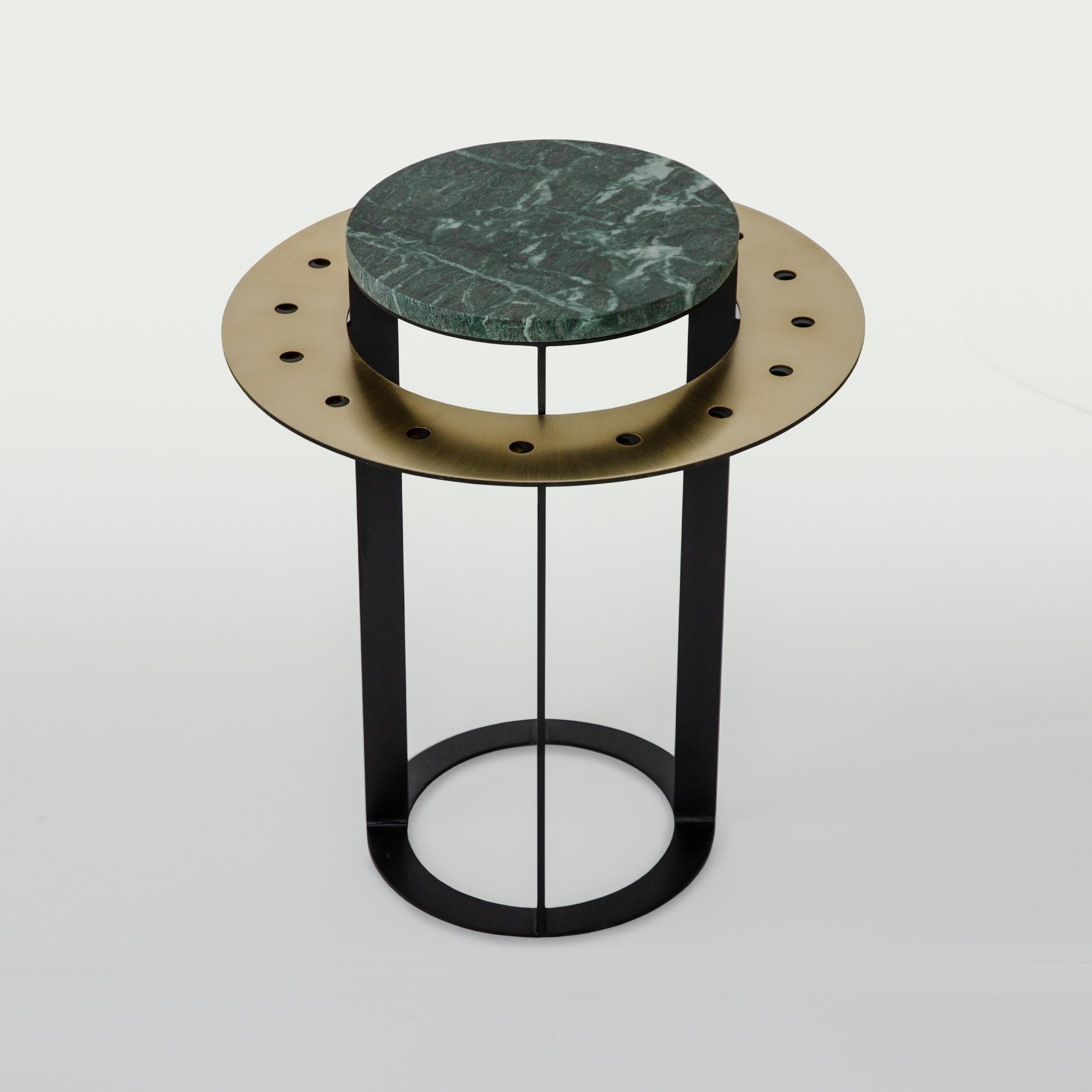 Lilith Side Table by Atlas Project
Dimensions: Ø 38 x H 46 cm. 
Materials: Black painted iron and Green Guatemala marble.

Available in different materials and sizes. Please contact us.

L i l i t h C o f f e e t a b l e s
Inspired by the ancient